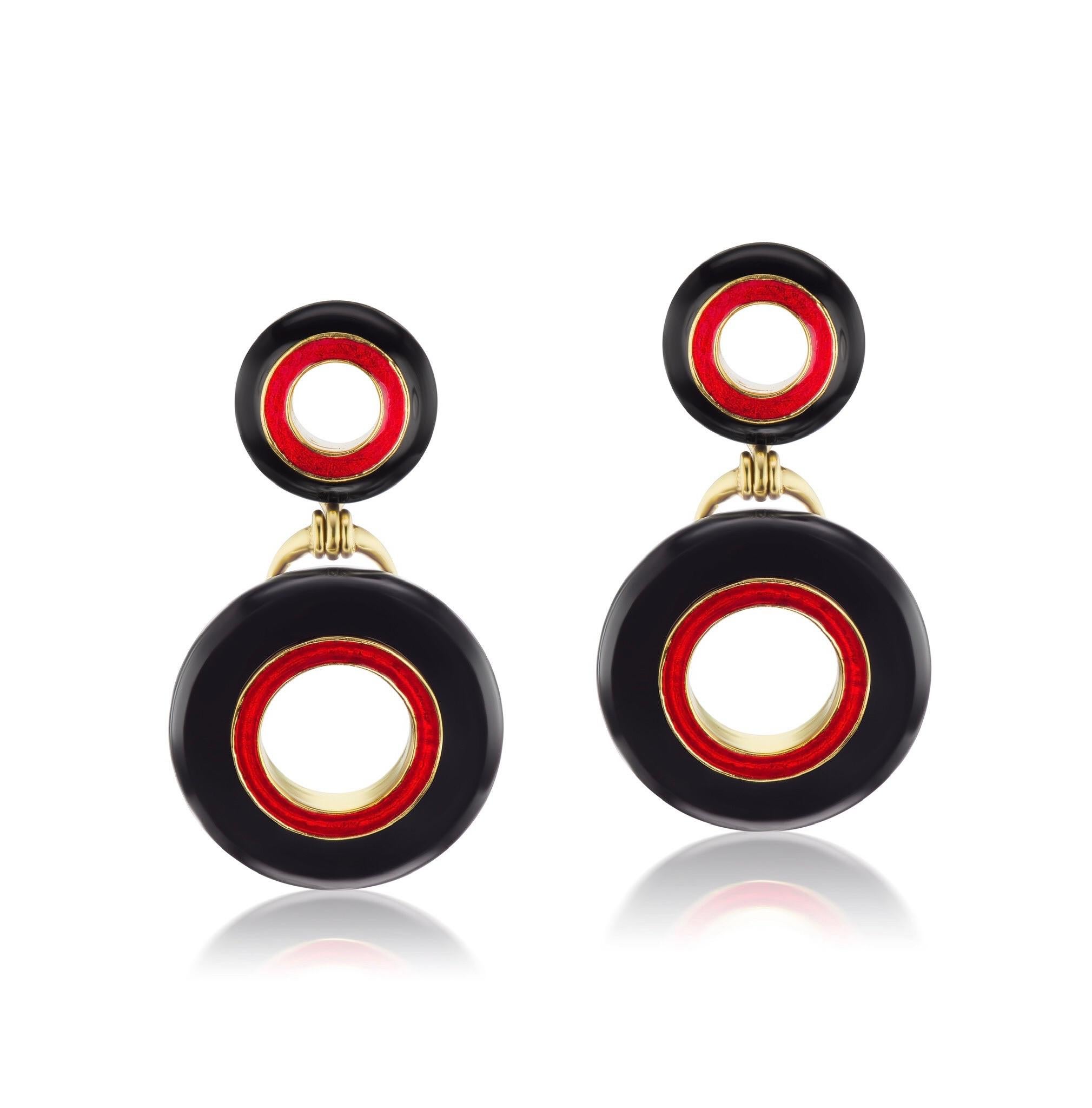 These Andrew Glassford earrings are part of his Donut Series. They are Black Jade and measure 12mm wide on top and 20mm wide on the bottom. They have a movement with a 