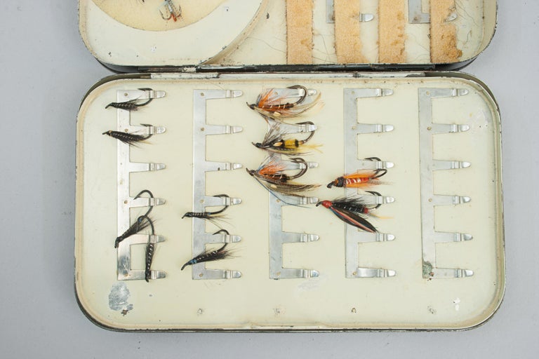 19th century fly fishing box Vintage Aluminium with Hand-Tied Flies An up and coming favorite for those who love fly fishing and appreciate the vintage style Black Japanned Fly Fishing Box