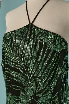 Black jersey backless jumpsuit with green rhinestone ALEXANDRE VAUTHIER