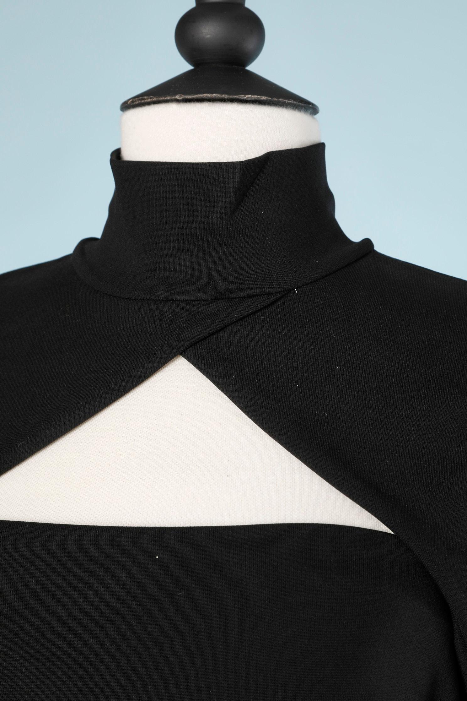 Black jersey dress with triangle shape neckline and high collar 