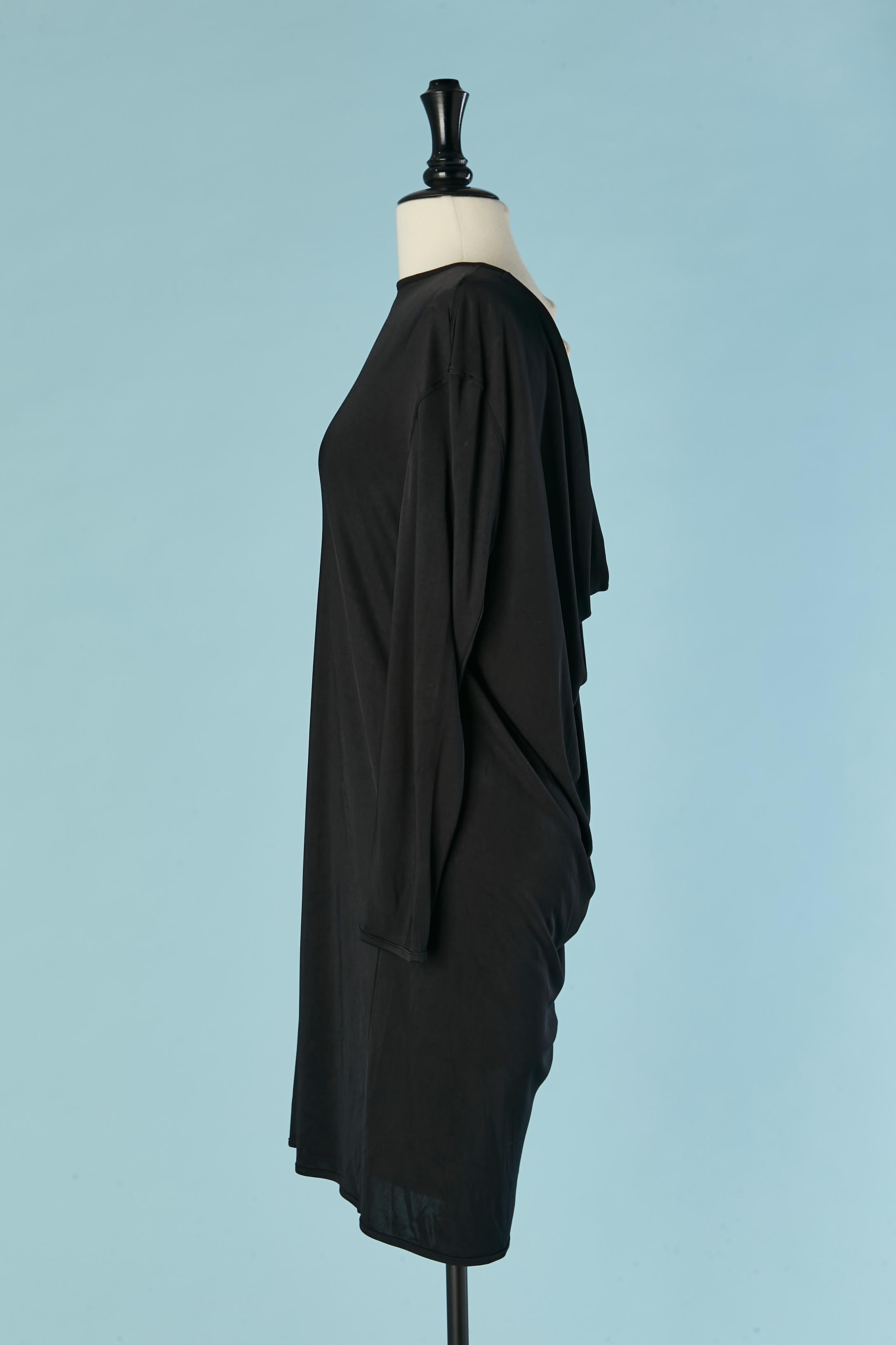 Black jersey dress draped on the back. Fabric composition: 100% rayon 
SIZE 40 (Fr) L 
