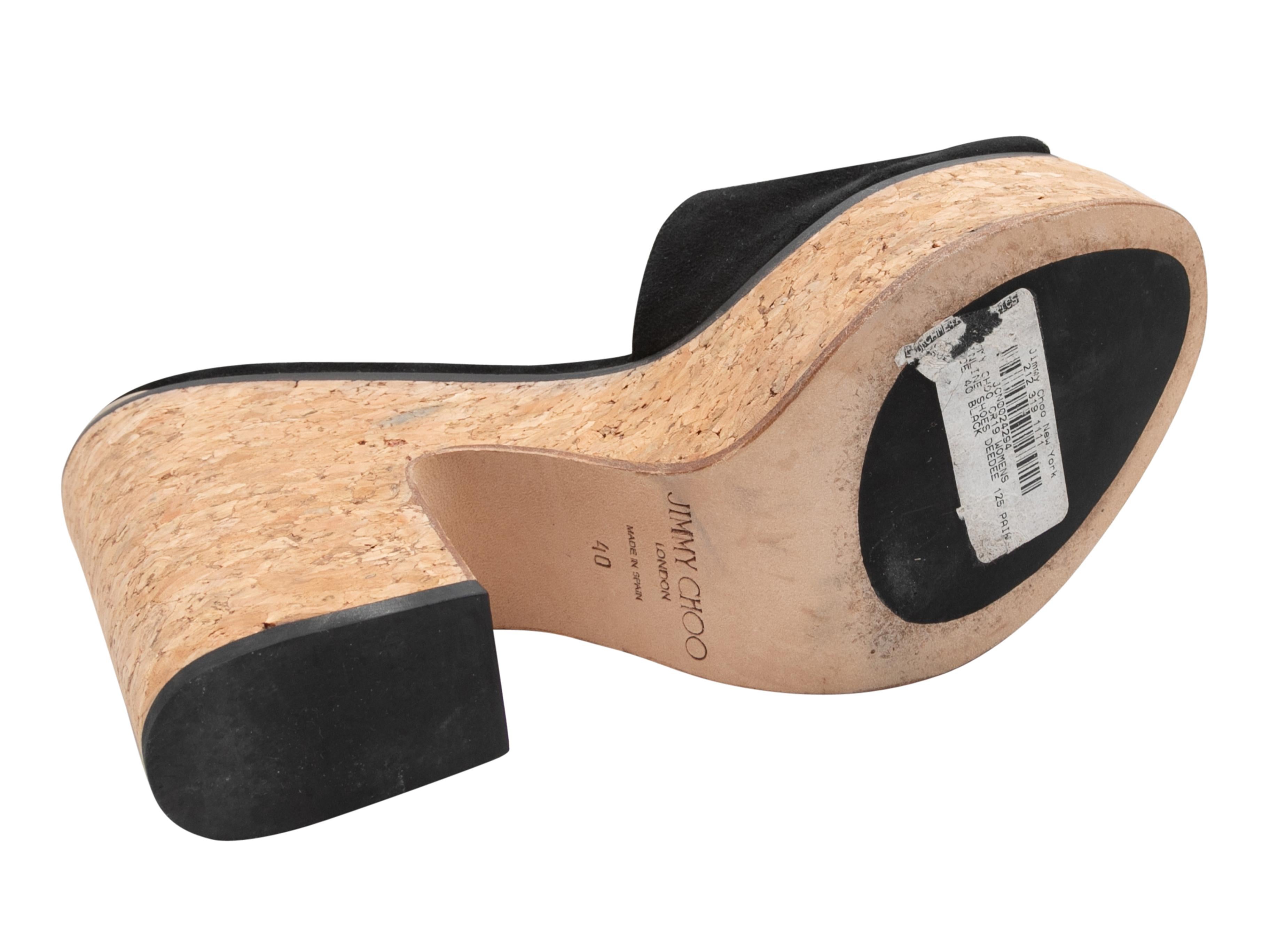 Black suede platform slide sandals by Jimmy Choo. Cork soles. 1.5
