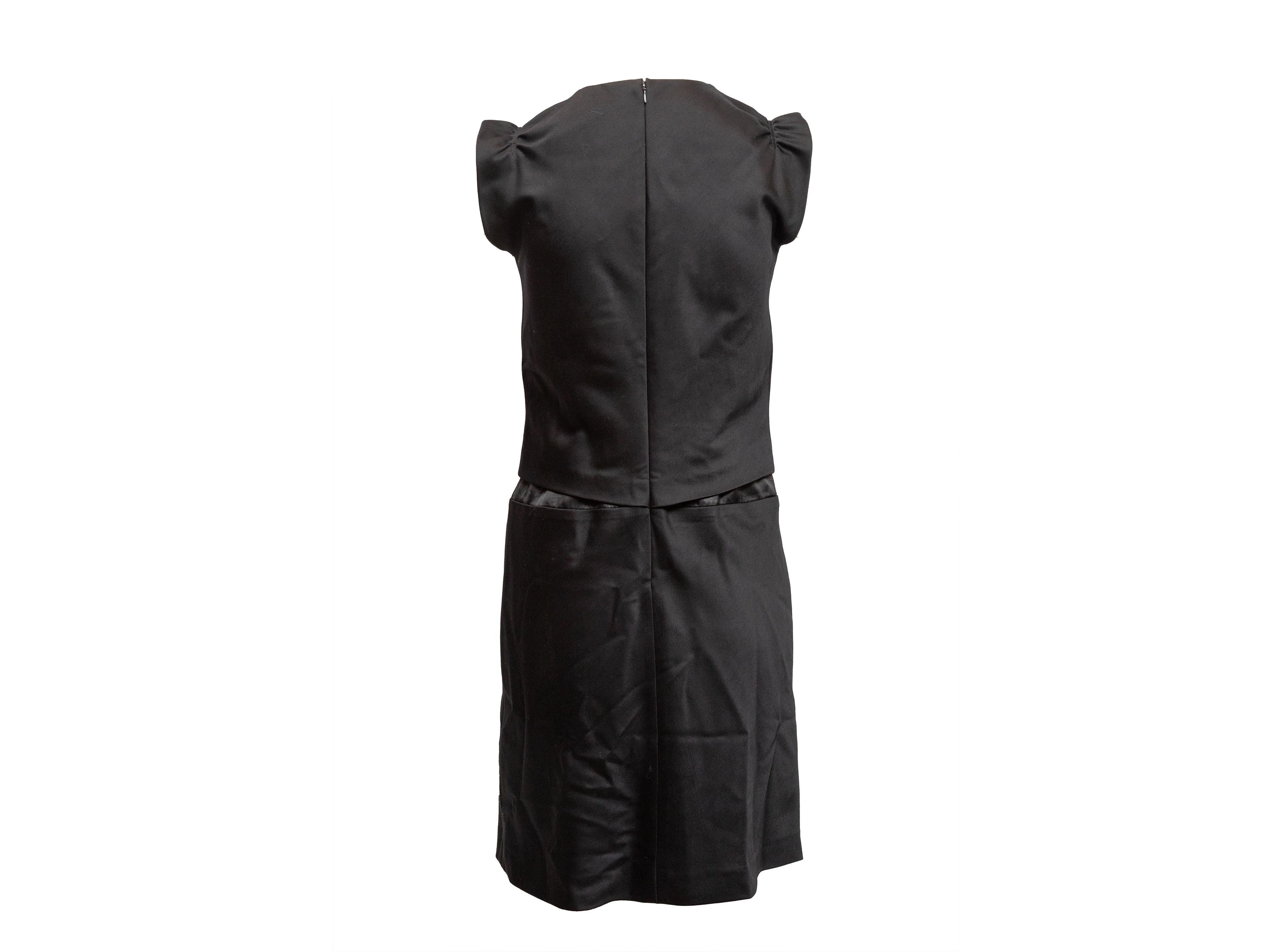 Vestido negro Kenzo con rosetón y mezcla de lana Talla IT 38 Negro en venta