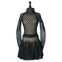 Conjunto de top y falda de punto negro y lúrex ALAIA