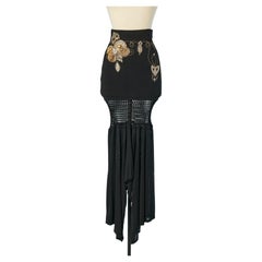 Black knit asymmetrical skirt with embroideries CHRISTIAN DIOR Boutique