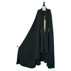 Black knit cape with black ribbon satin bow on the top front Chanel 