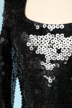 Black knit cocktail dress with covered of round sequin Circa 1960's