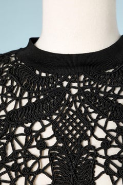 Black knit dress with passementerie lace on the cut off  Christian Lacroix