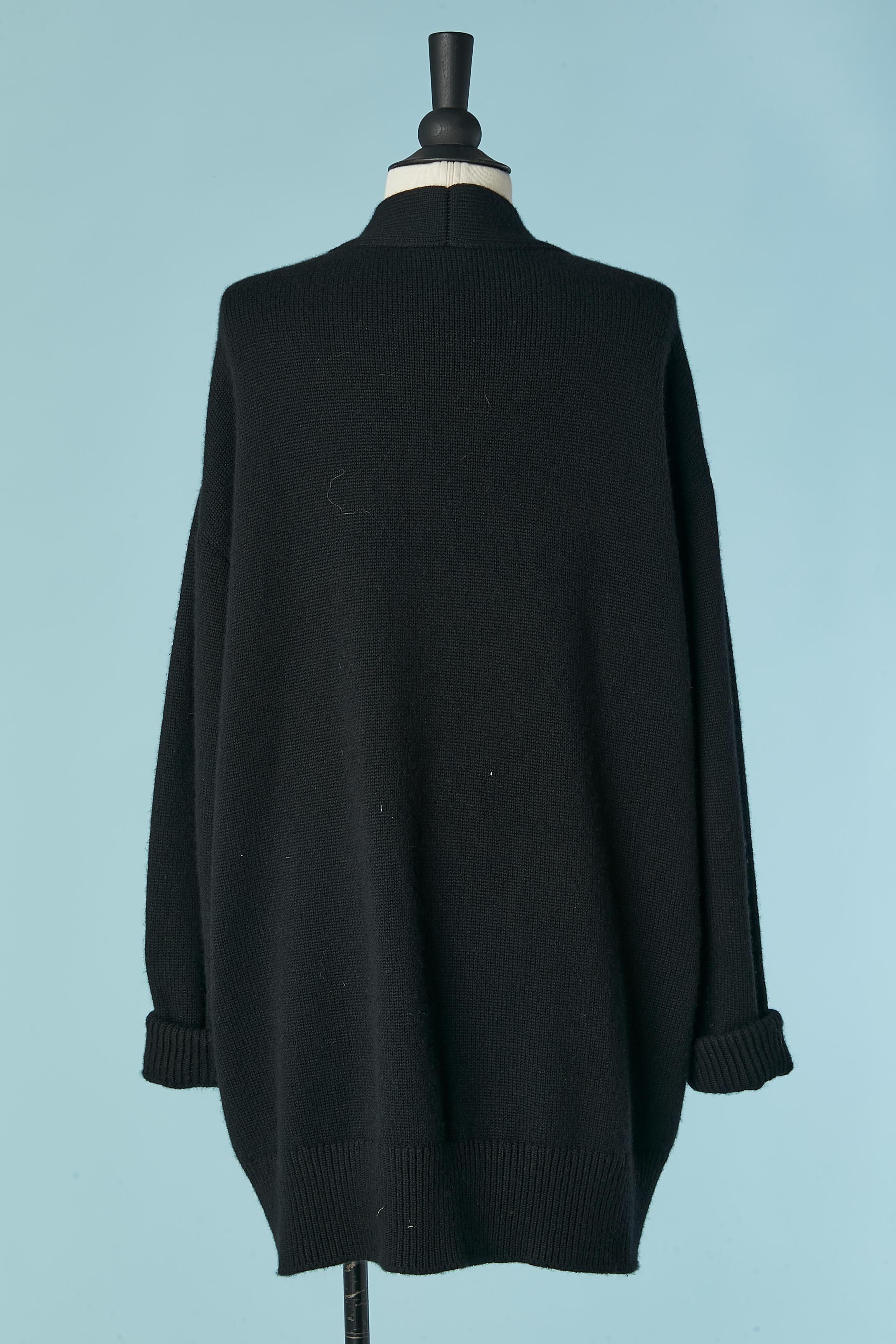Black knit oversize cashmere cardigan with white feathers 