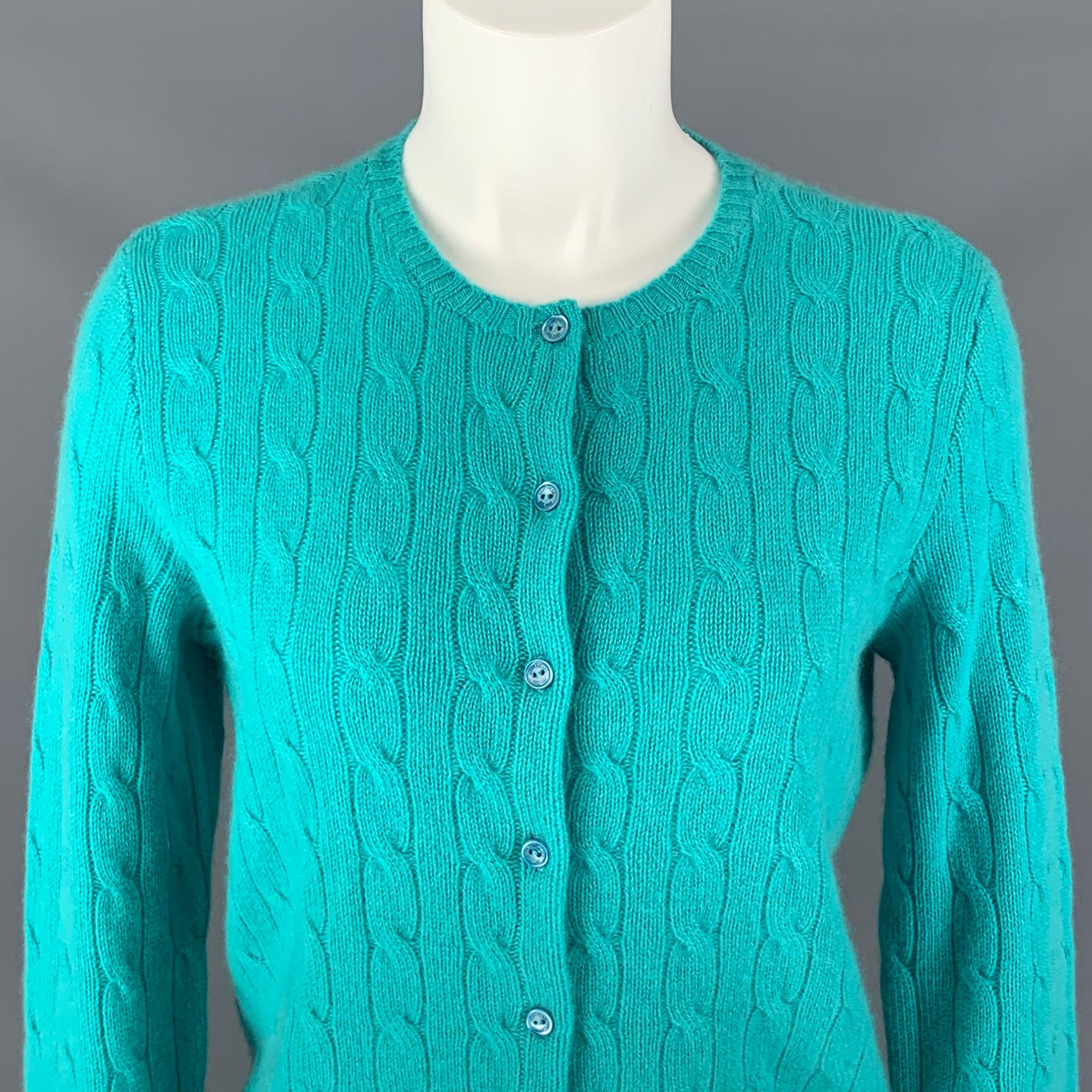 RALPH LAUREN BLACK LABEL cardigan sweater comes in a aqua cable knit cashmere featuring crew neck, button down and long sleeves. Excellent Pre-Owned Condition. 

Marked:   L 

Measurements: 
 
Shoulder: 15.5 inBust: 37 inSleeve: 28 inLength: 23 in
 