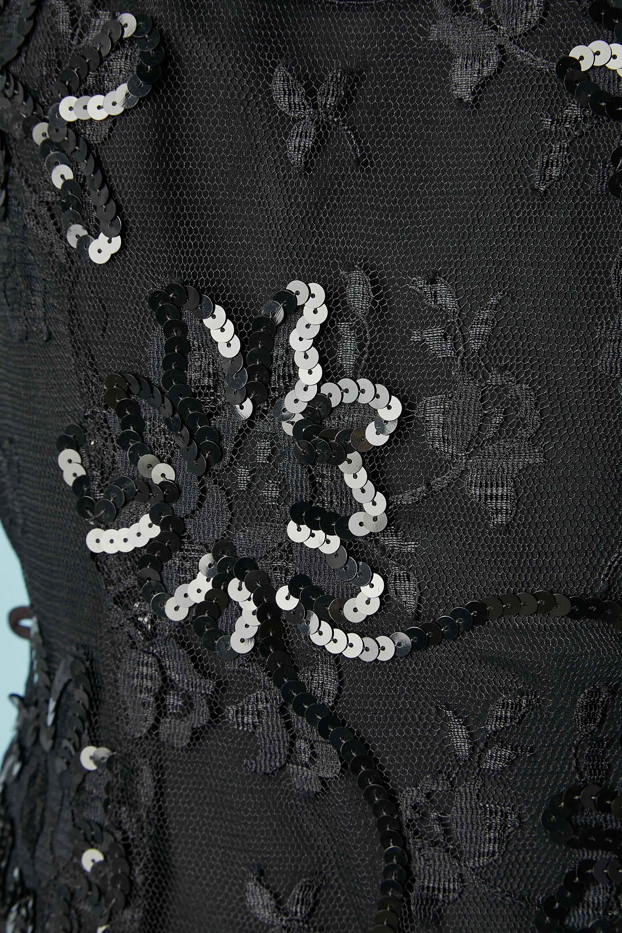 Black lace a sequin bustier cocktail dress. Boned. Polyester lining. Zip and hook&eye on the left side. Mini belt-loop ( belt is missing) 
SIZE 6 ( S) 