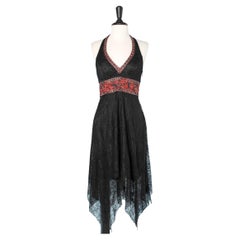 Black lace cocktail dress with beadwork on waist and neckline 