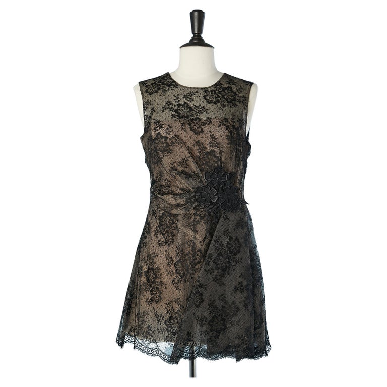 Black lace cocktail dress with nude silk lining and flower embroidery ...
