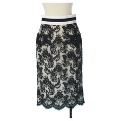 Black lace skirt with white lining and striped sporty ribbings Chanel 