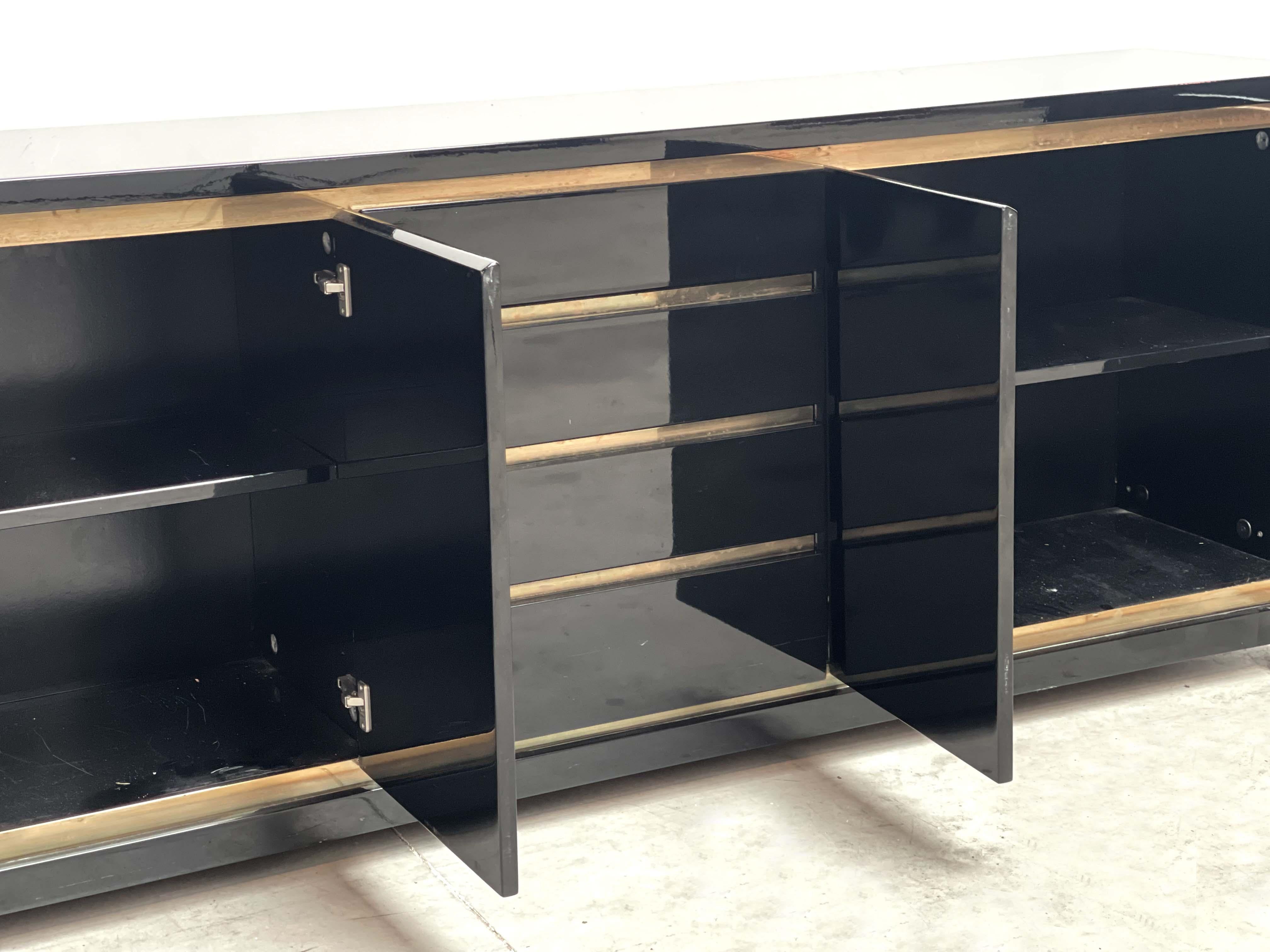 Late 20th Century Black lacquer and brass sideboard by Jean Claude Mahey, 1970s  For Sale