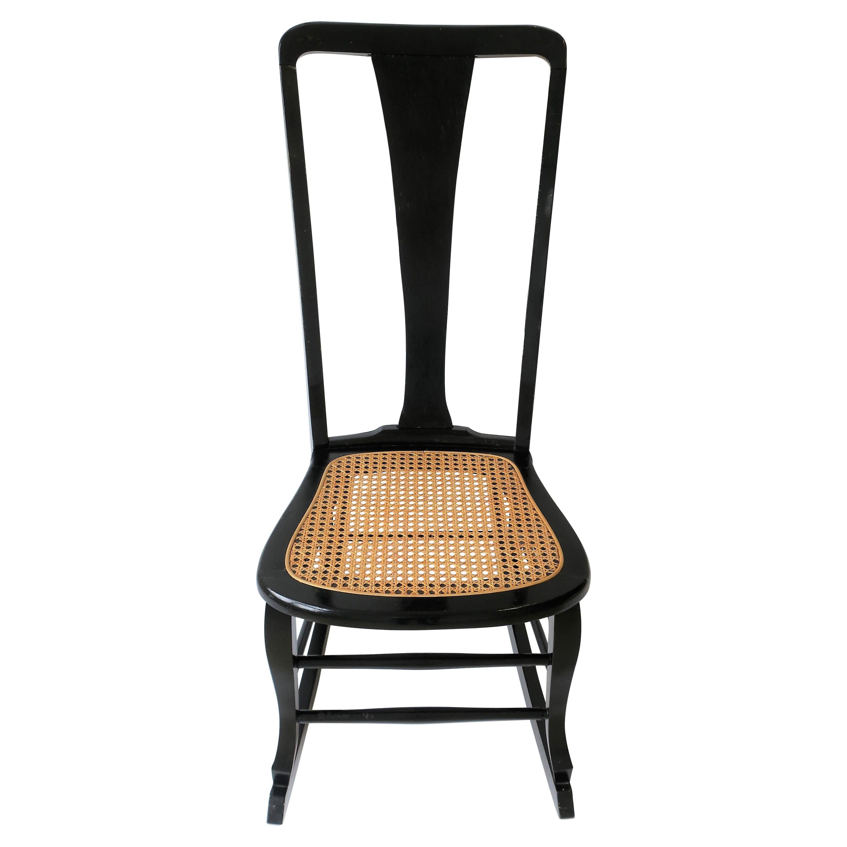 Wicker Cane and Black Wood Rocking Chair