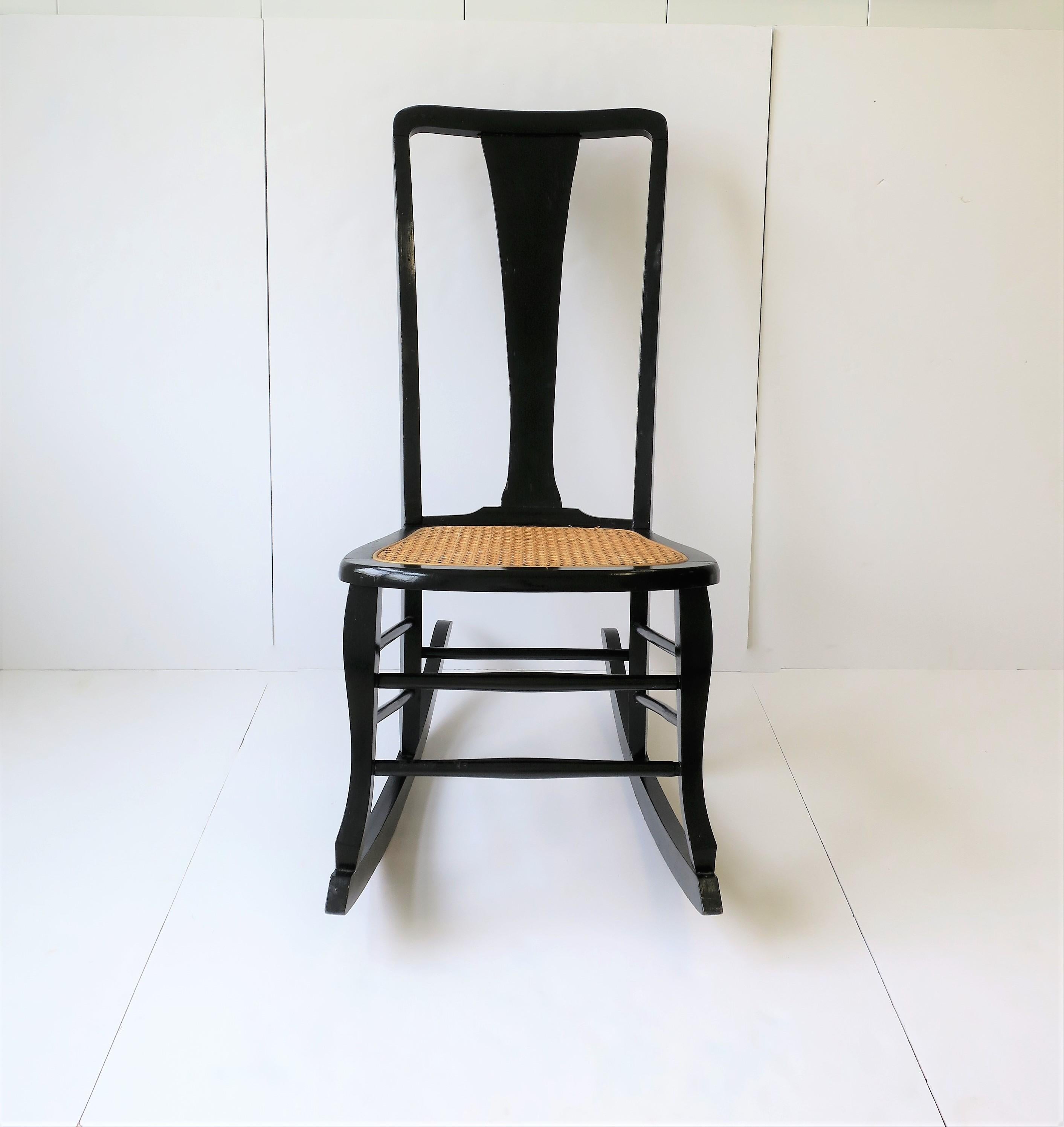 Wicker Cane and Black Wood Rocking Chair For Sale 2
