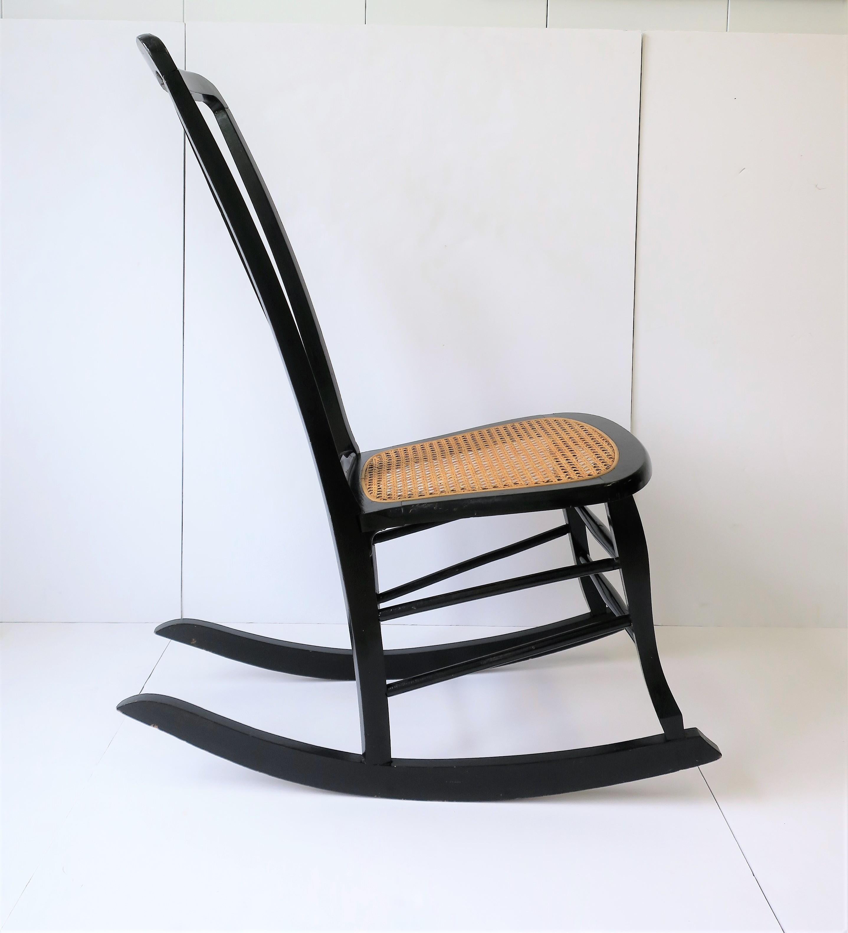 Wicker Cane and Black Wood Rocking Chair For Sale 1