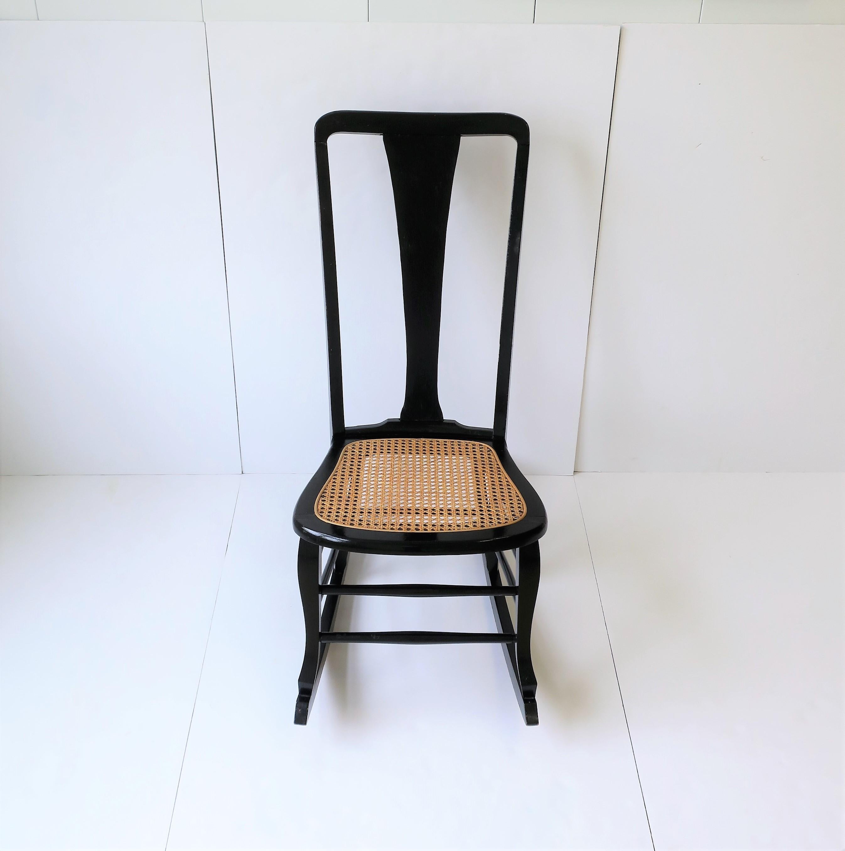 Wicker Cane and Black Wood Rocking Chair For Sale 3