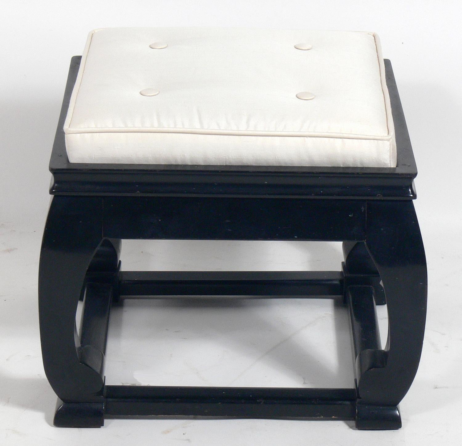 Black lacquer and silk chinoiserie stools, Asian, circa 1950s. They retain their original black lacquer finish and have been reupholstered in an ivory color silk upholstery.