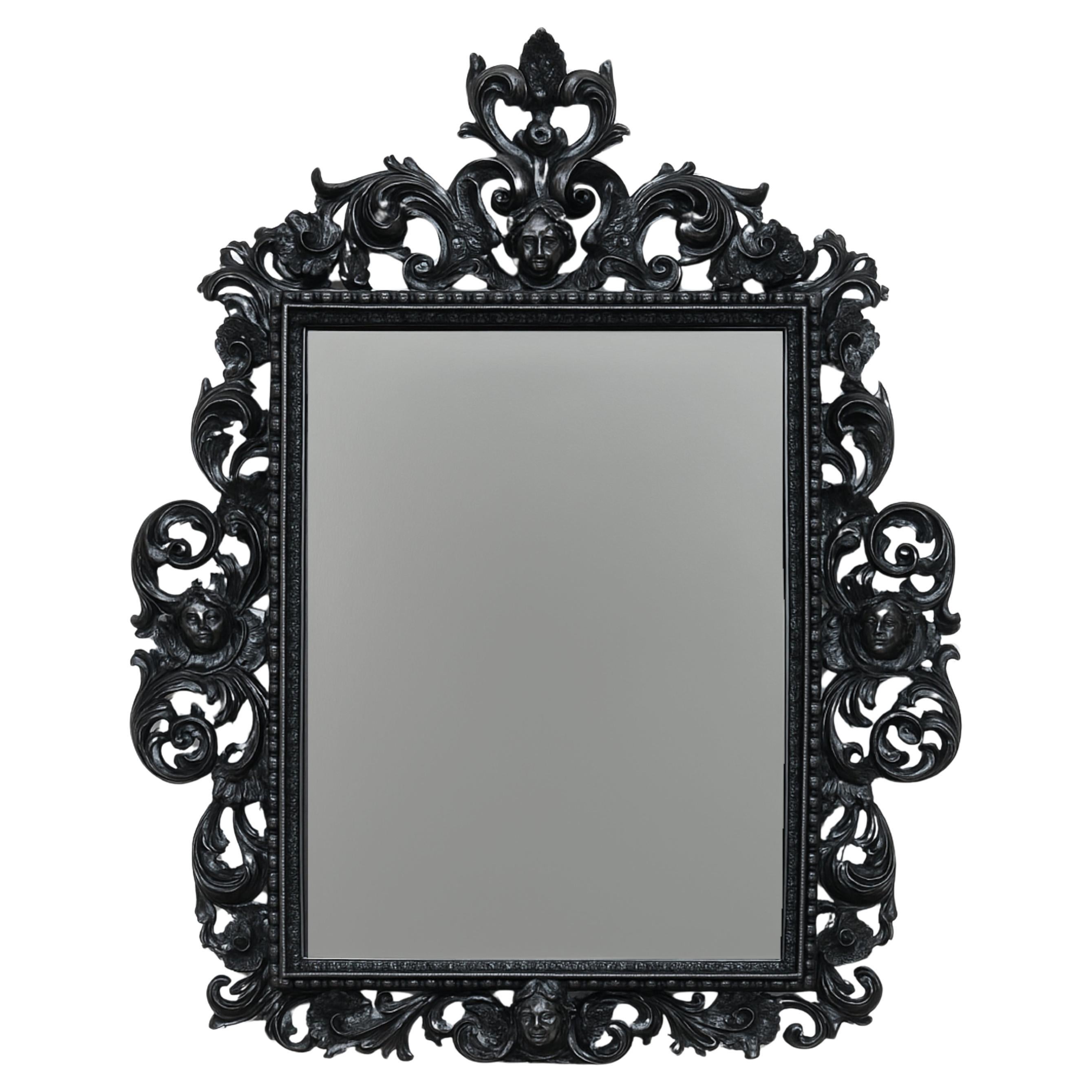 Miroir baroque en laque noire avec chérubins, fin du XVIIIe siècle, repeint