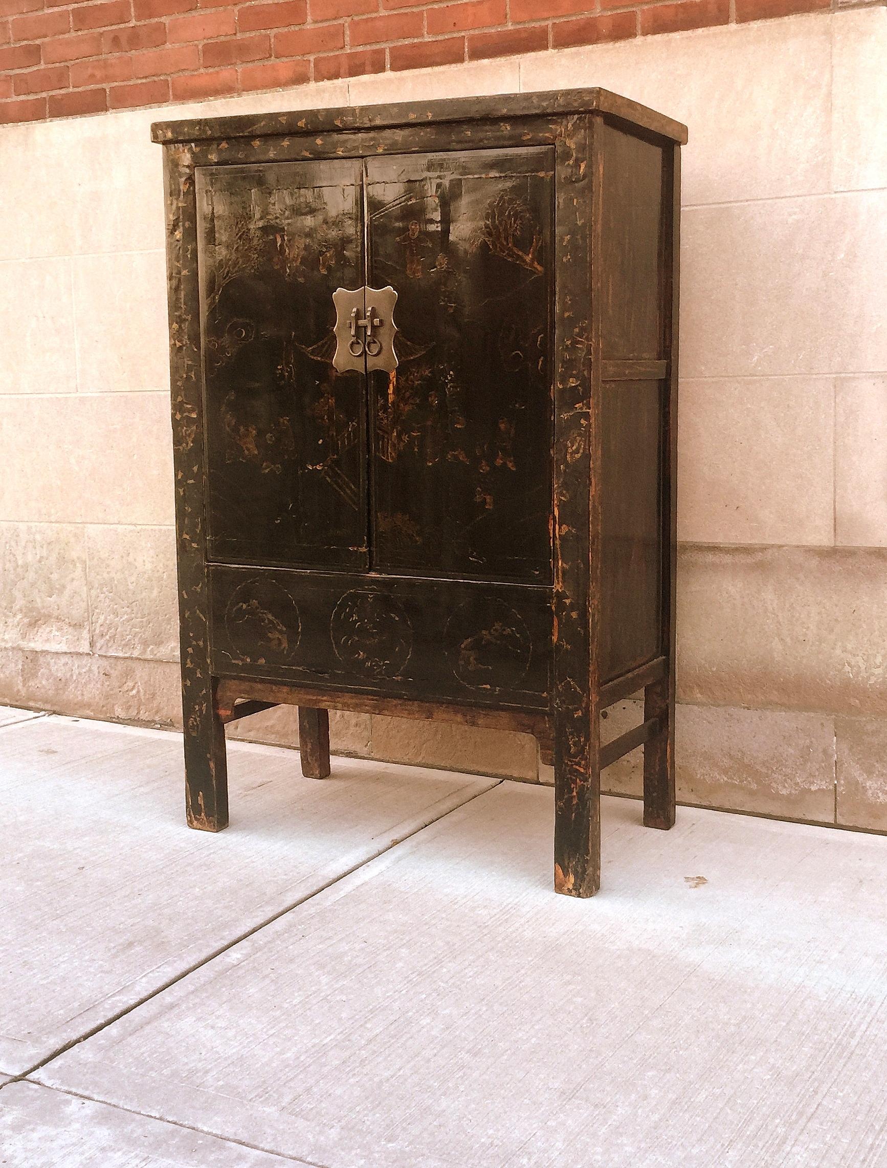 Polished Black Lacquer Cabinet with Gilt Motif For Sale