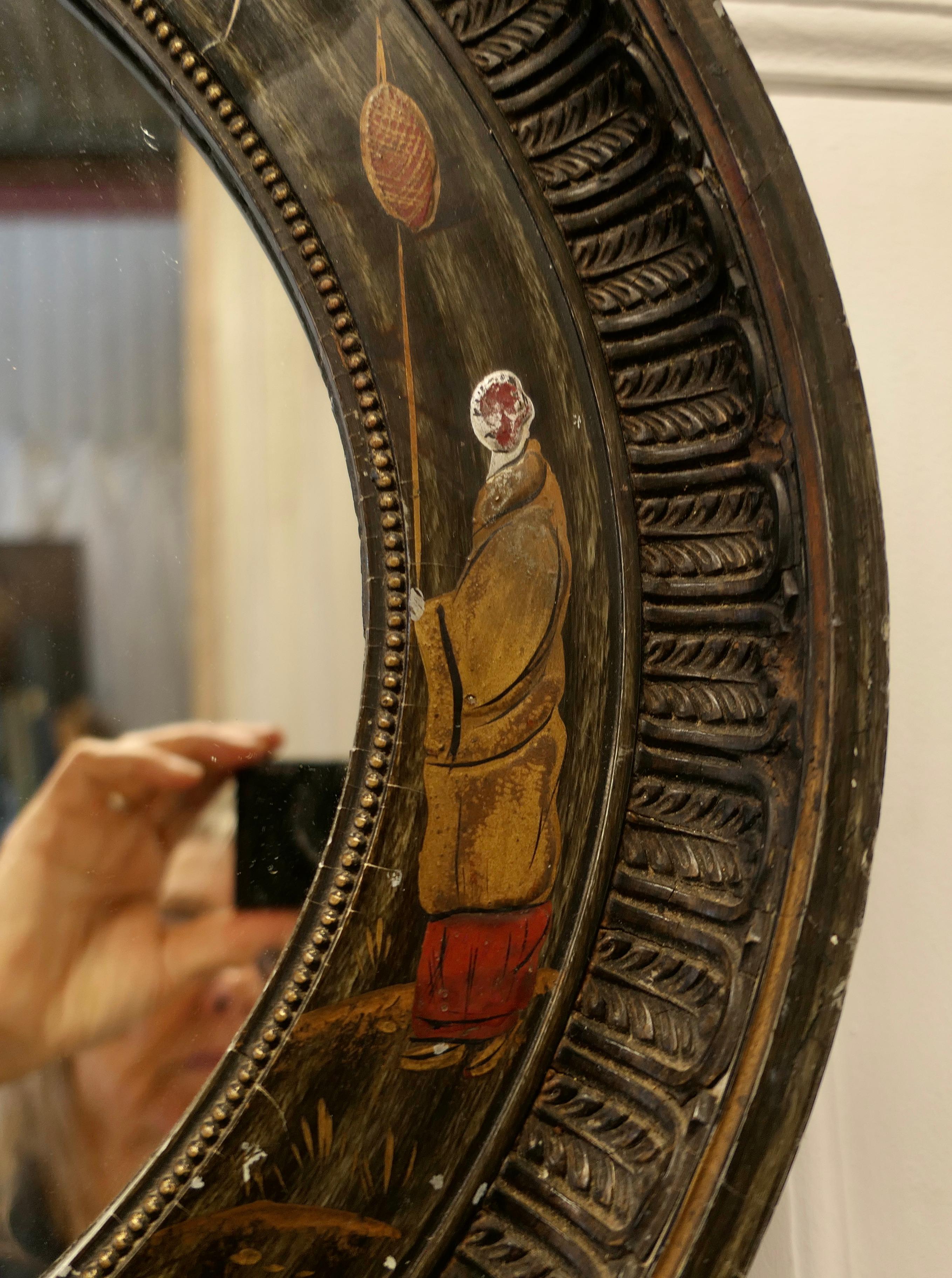 Black Lacquer Carved Chinoiserie Oval Wall Mirror     For Sale 1