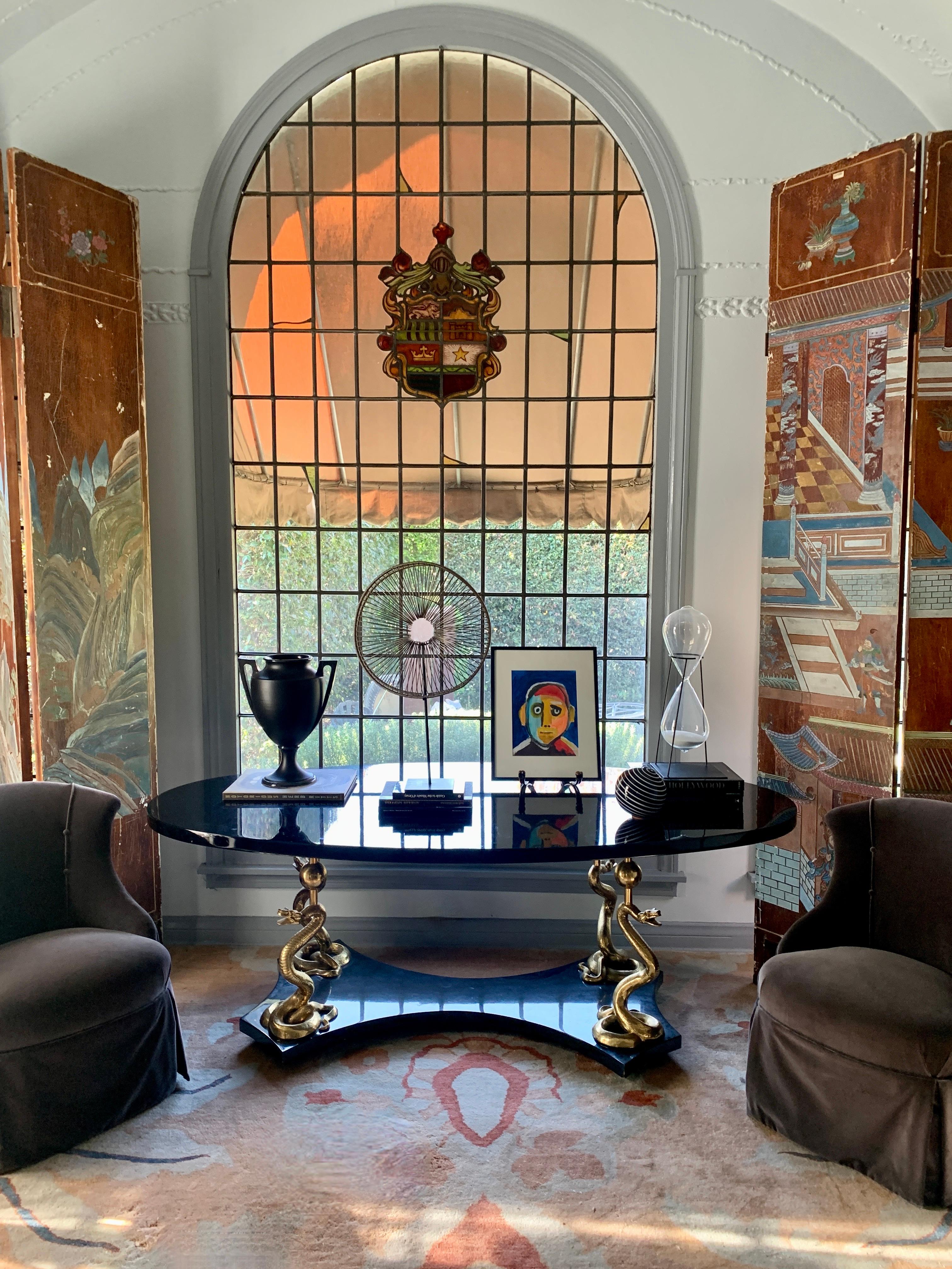 Oval Black Lacquer Console or Center Table 24k Gilt Legs After Salvador Dali In Good Condition For Sale In Los Angeles, CA