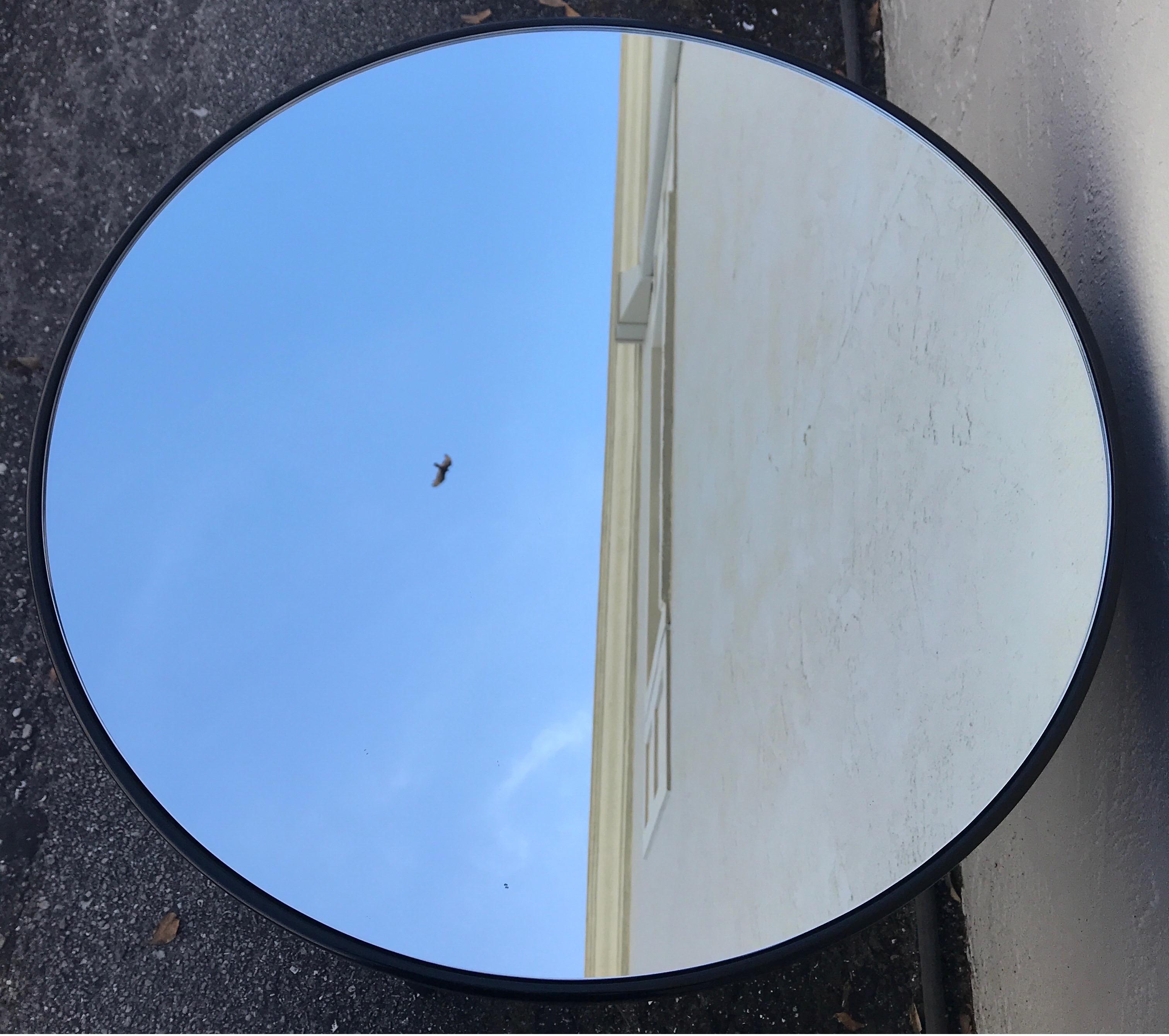 round mirrored nightstand