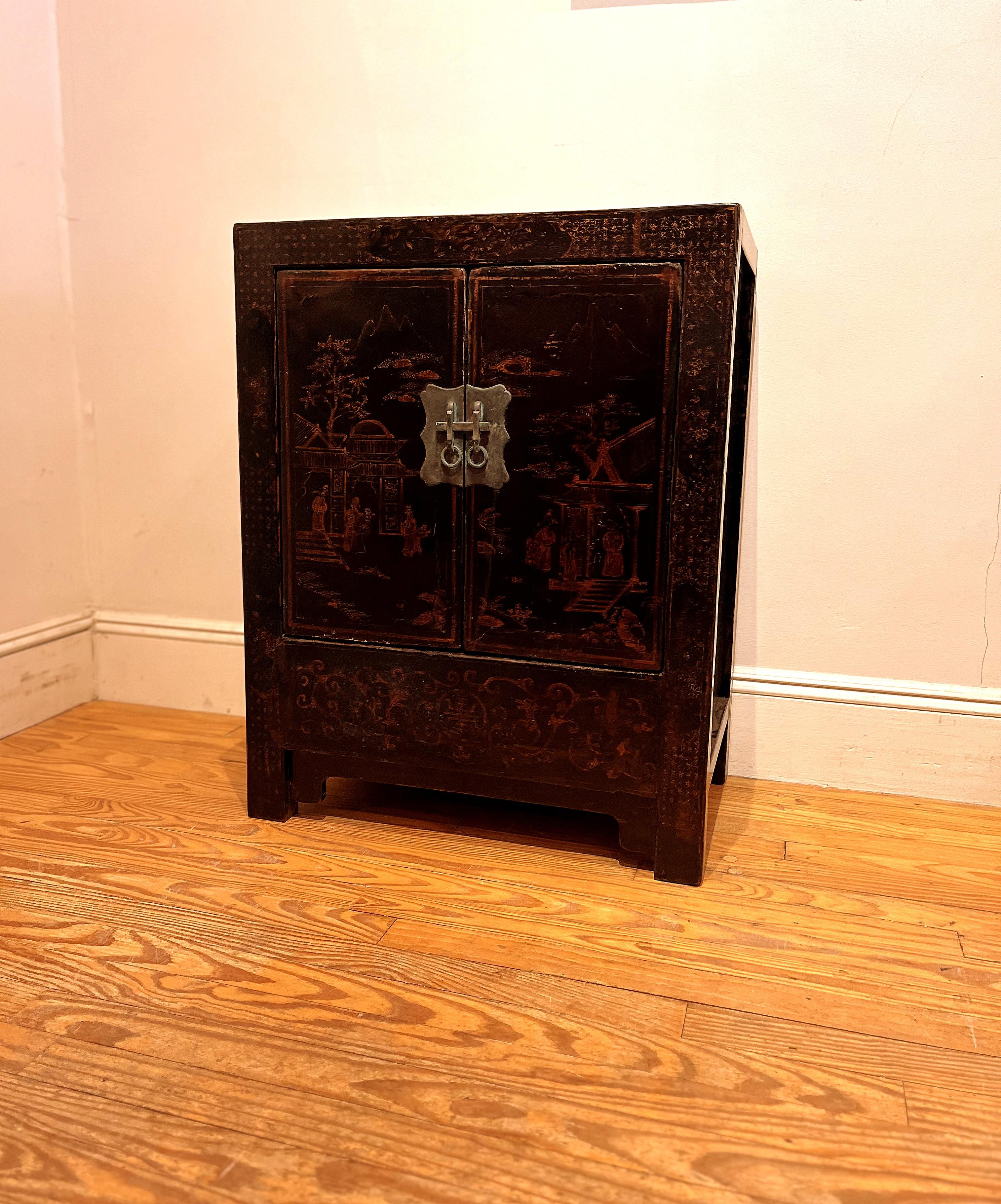 Chinoiserie Black Lacquer Chest with Gilt Motif For Sale