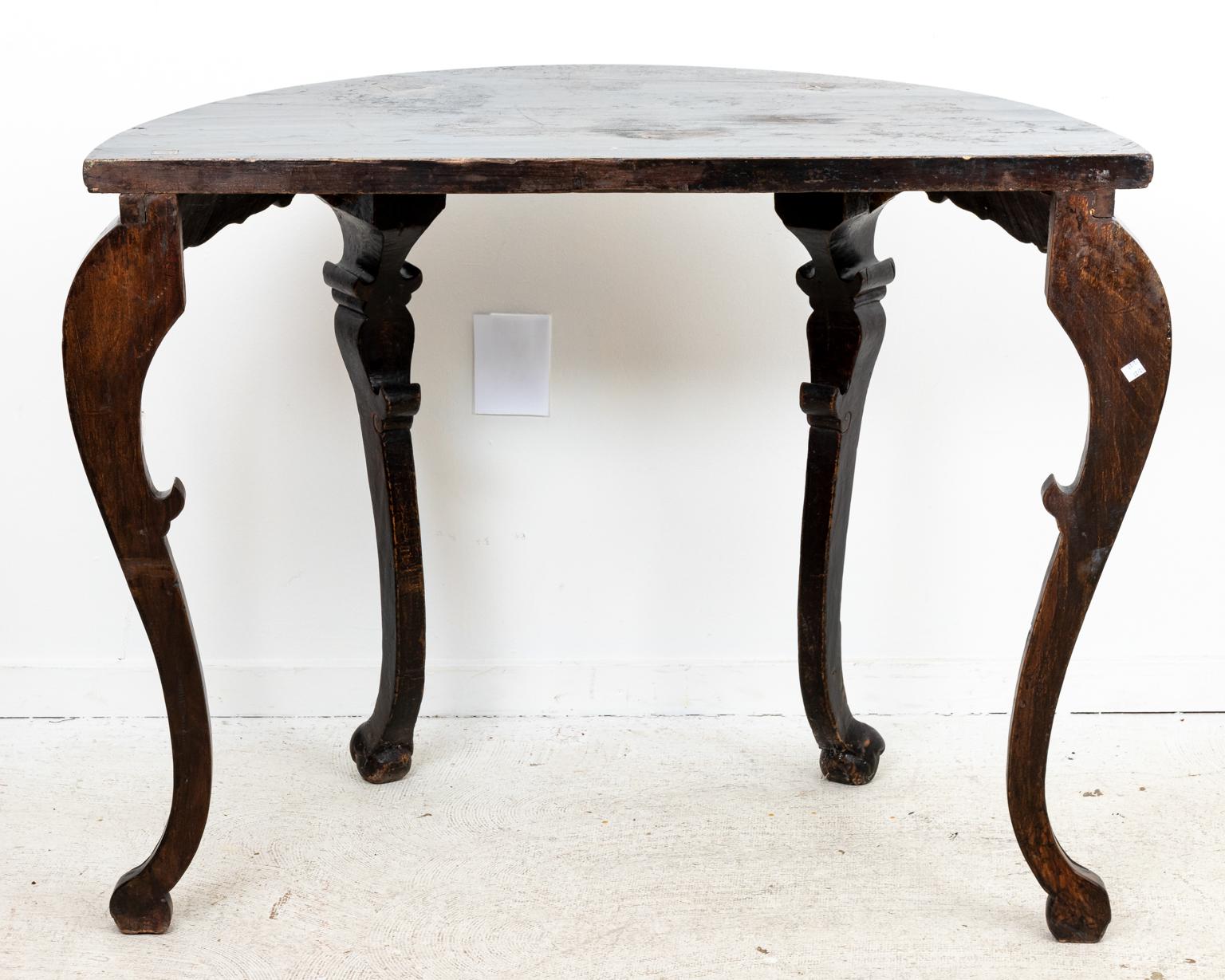 Circa 1900 Black lacquer Chinese demilune console table with curved skirt and cabriolet legs. Please note of wear consistent with age. Made in China.