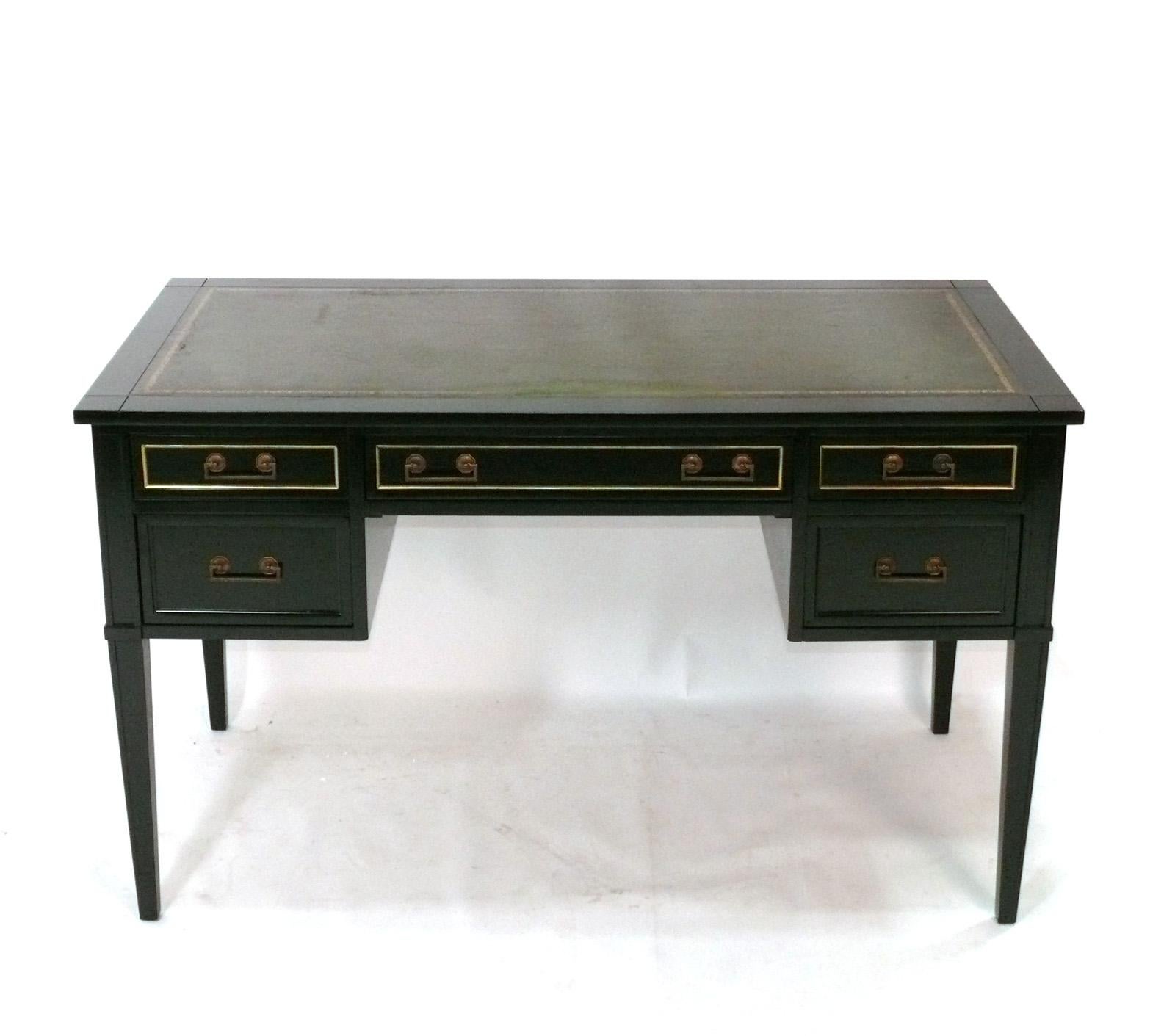 Elegant French Style Black Lacquer Desk with Inset Green Leather Top, probably American, circa 1950s. It has recently been refinished in black leather. The inset leather top is a beautiful deep green color and contrasts well with the black lacquer.