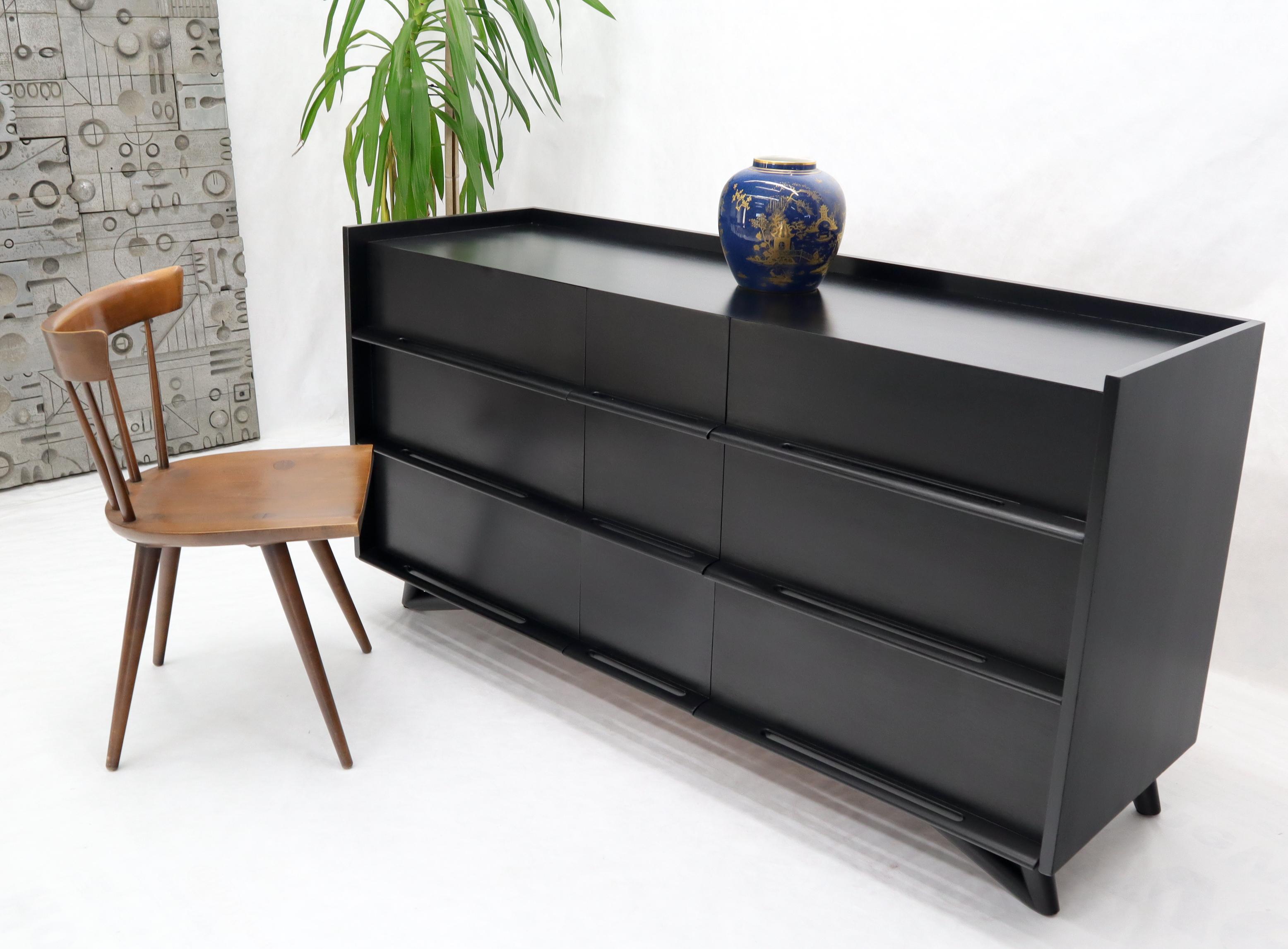 Nine 9 drawers black lacquer Mid-Century Modern long credenza dresser attributed to Edmond Spence.