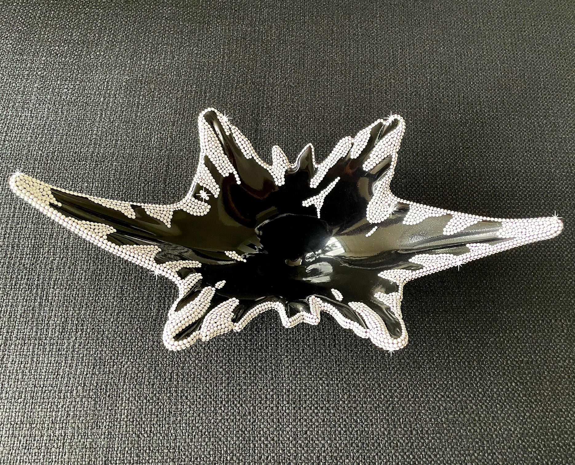 This piece is part of my up-cycled group of objects.I find pieces that have beautiful lines but need to be rescued. In this case I wanted to do a black lacquer finish. With an Artisan who is specialized in lacquer it is primed 2-3 times.Once that