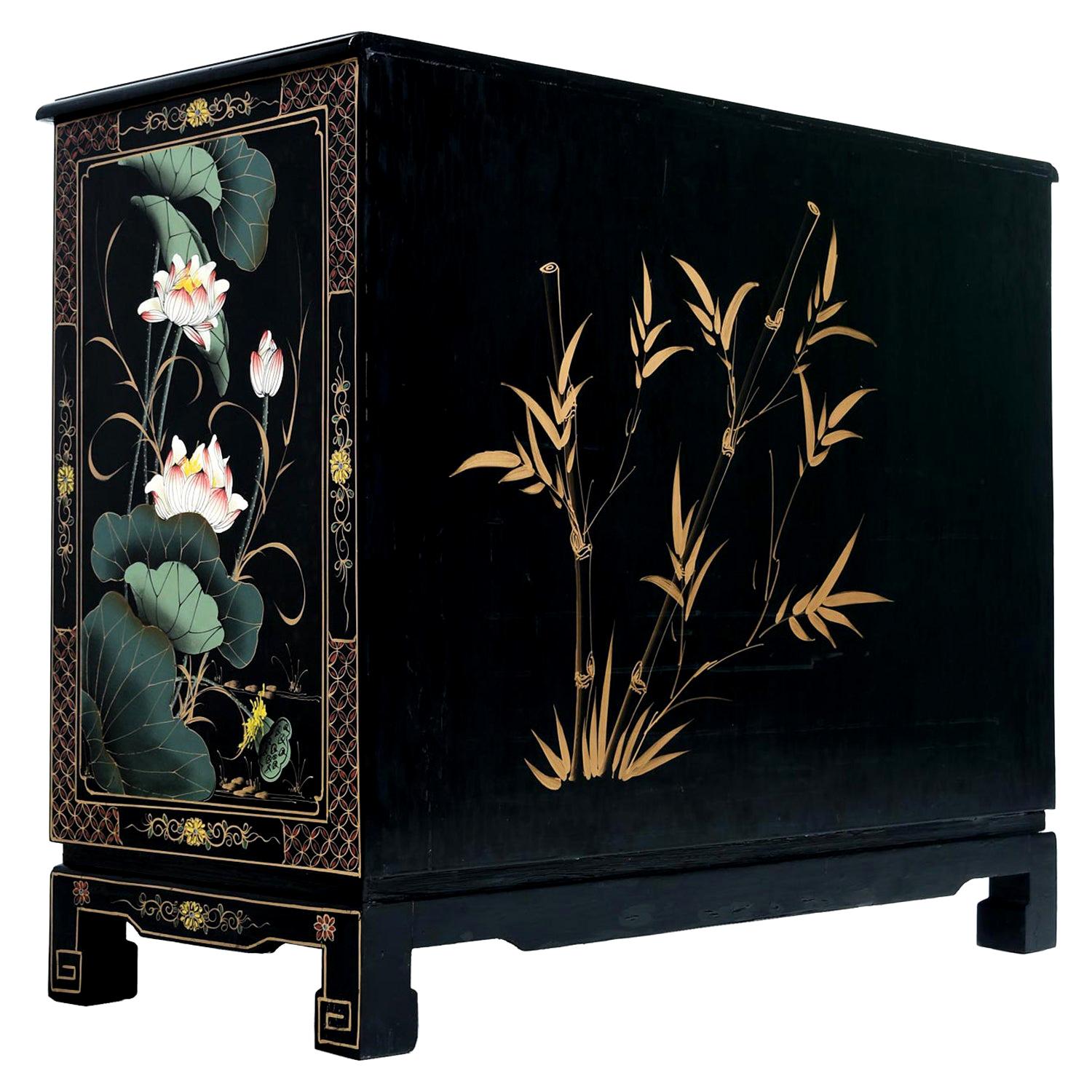 This incomparable chinoiserie black lacquer dresser depicts 12 mother of pearl figures in various tai chi poses. What more can you ask for really? As if that's not enough, there's plenty of traditional hand painted Asian motif from head to toe. The