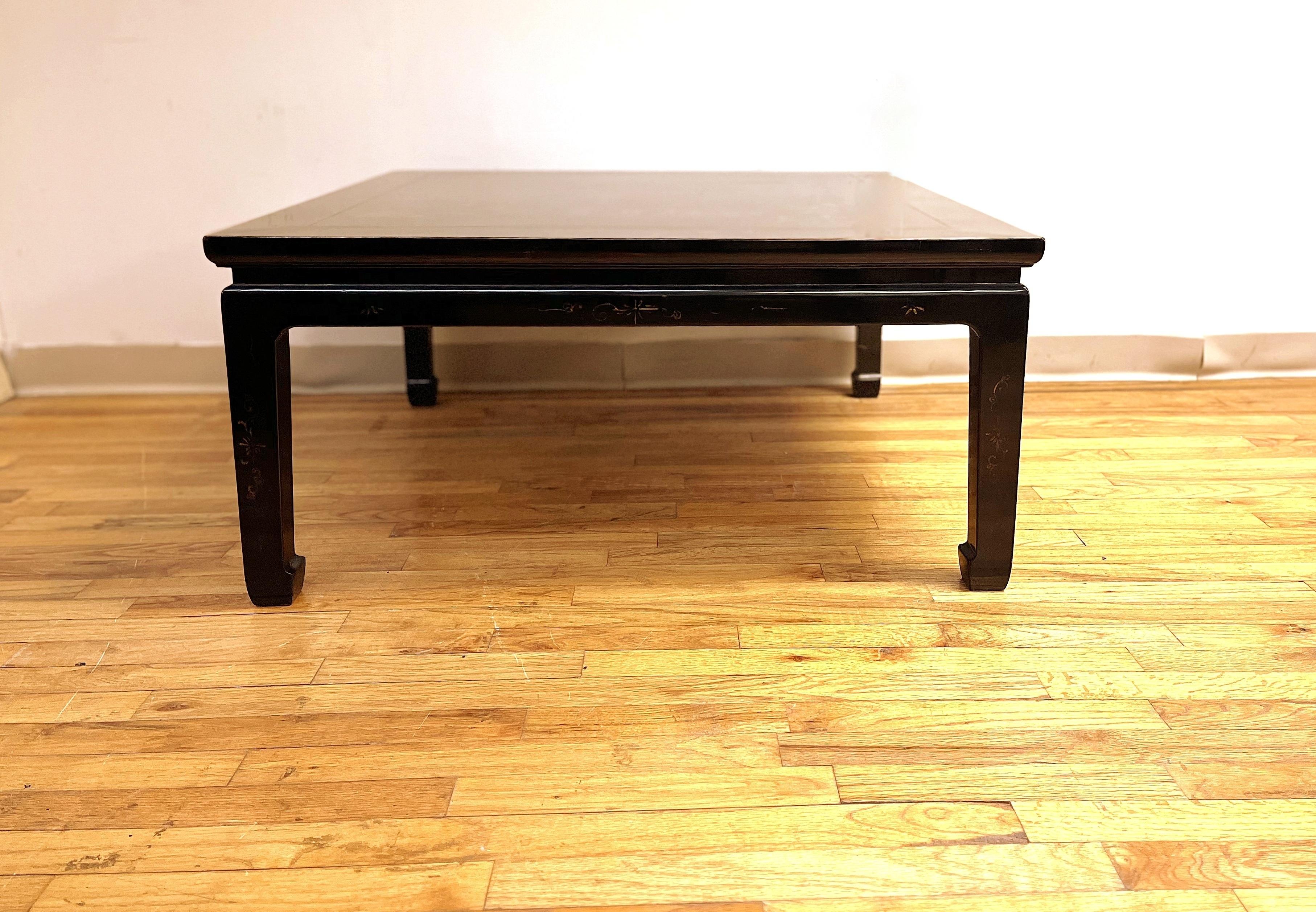 An elegant black lacquer square low table with gilt motif landscape top, gilt motif on apron and legs, simple and beautiful form. We carry Fine quality furniture with elegant finished and has been appeared many times in 