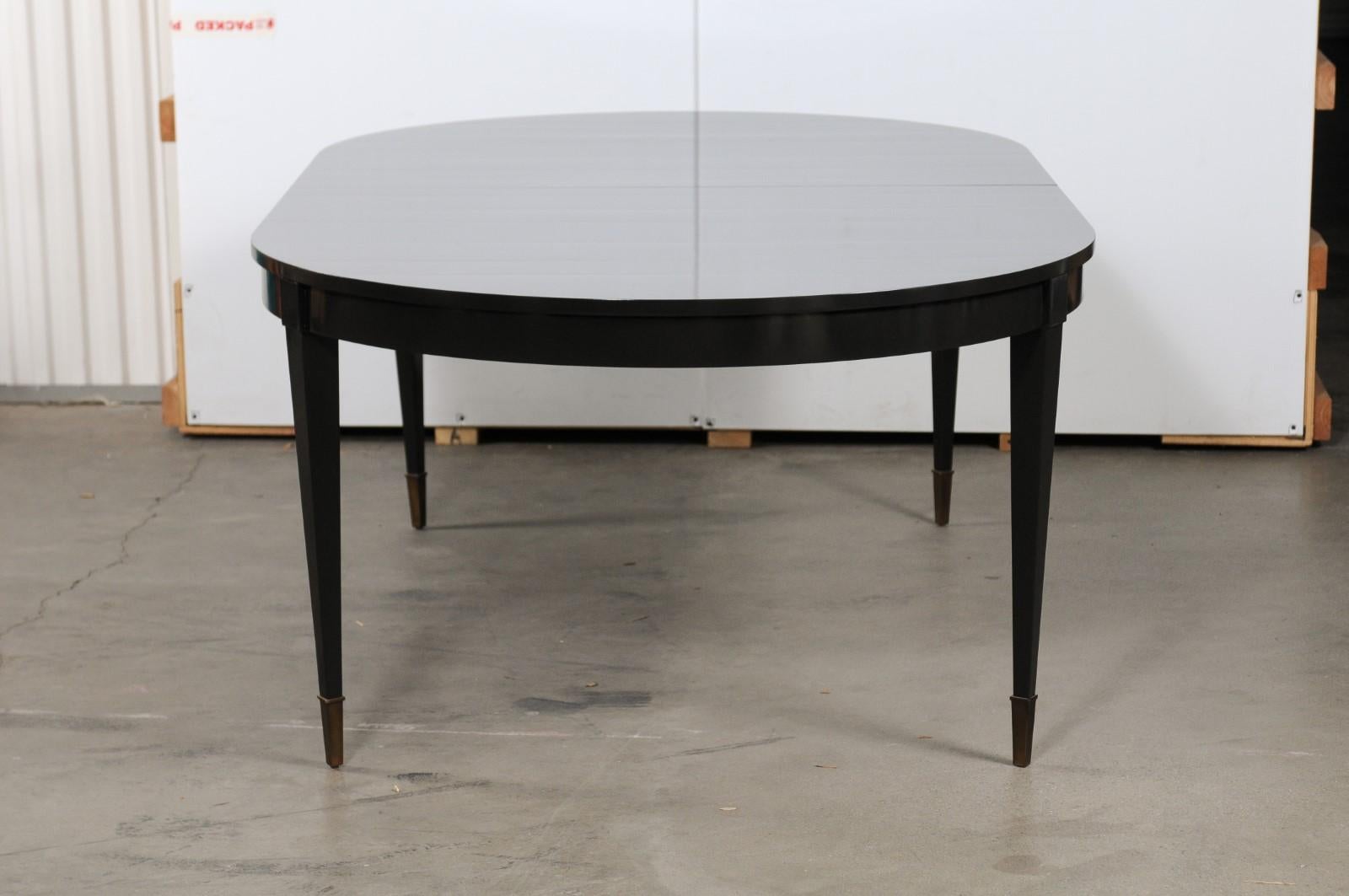 black oval extendable dining table