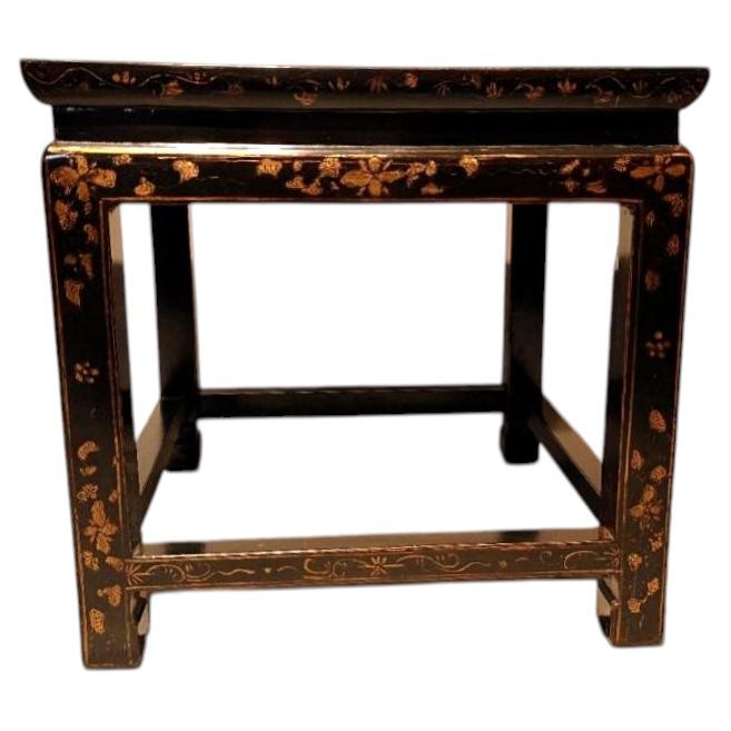 Black Lacquer Side Table with Gilt Motif For Sale