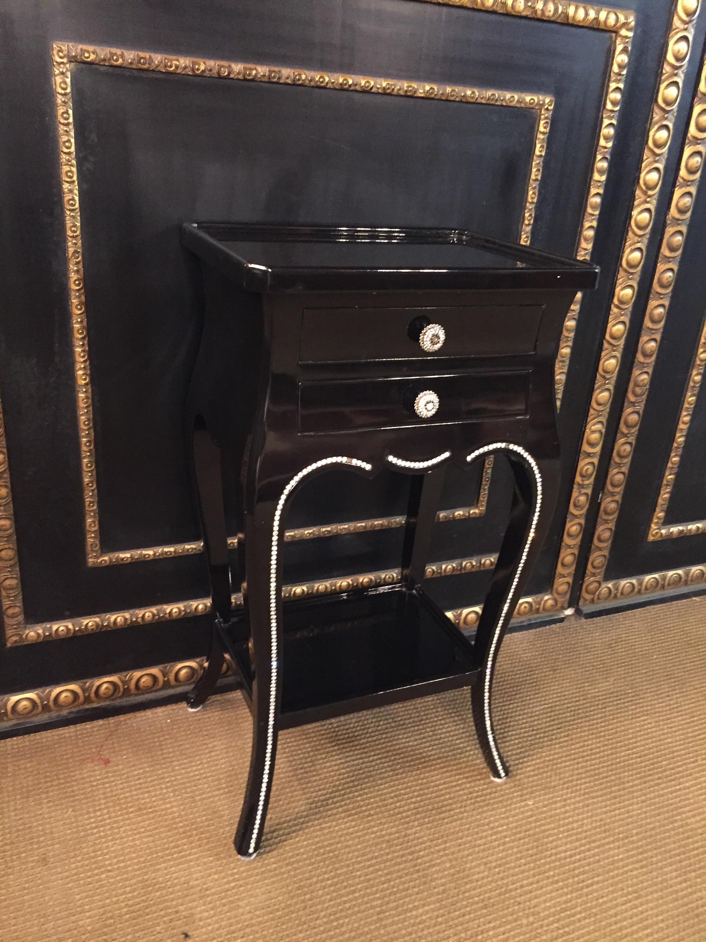 Nice side table
with two drawers,
on the sides and front ornamented with svarowski stones, crystals.