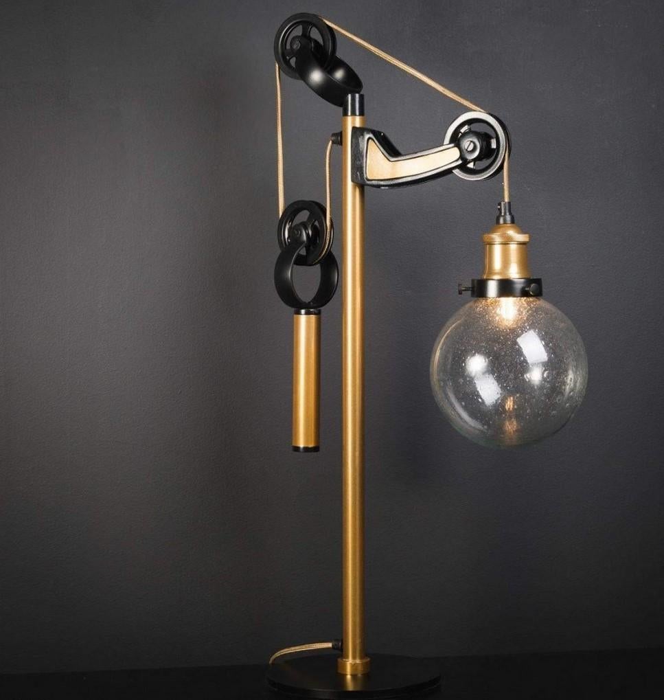 Black lacquered and brass metal with opaline glass large table lamp.
 