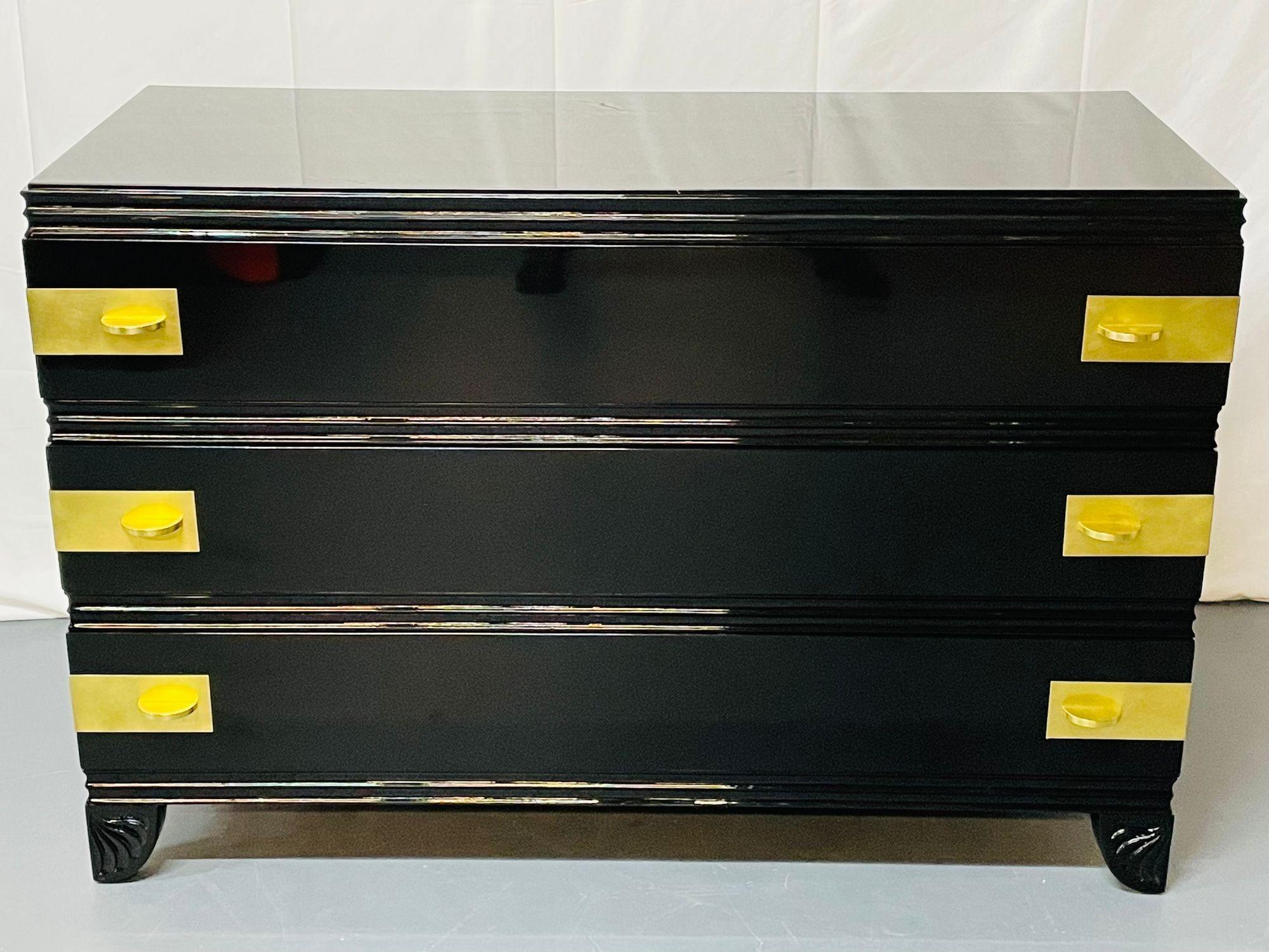 Parzinger Style Black Lacquered Campaign Chest, dresser or Commode, Hollywood Regency
 
 A stunning recently refinished chest of three drawers in the manner of Tommi Parzinger. Having a mirror like lacquer finish this magnificent chest is certain