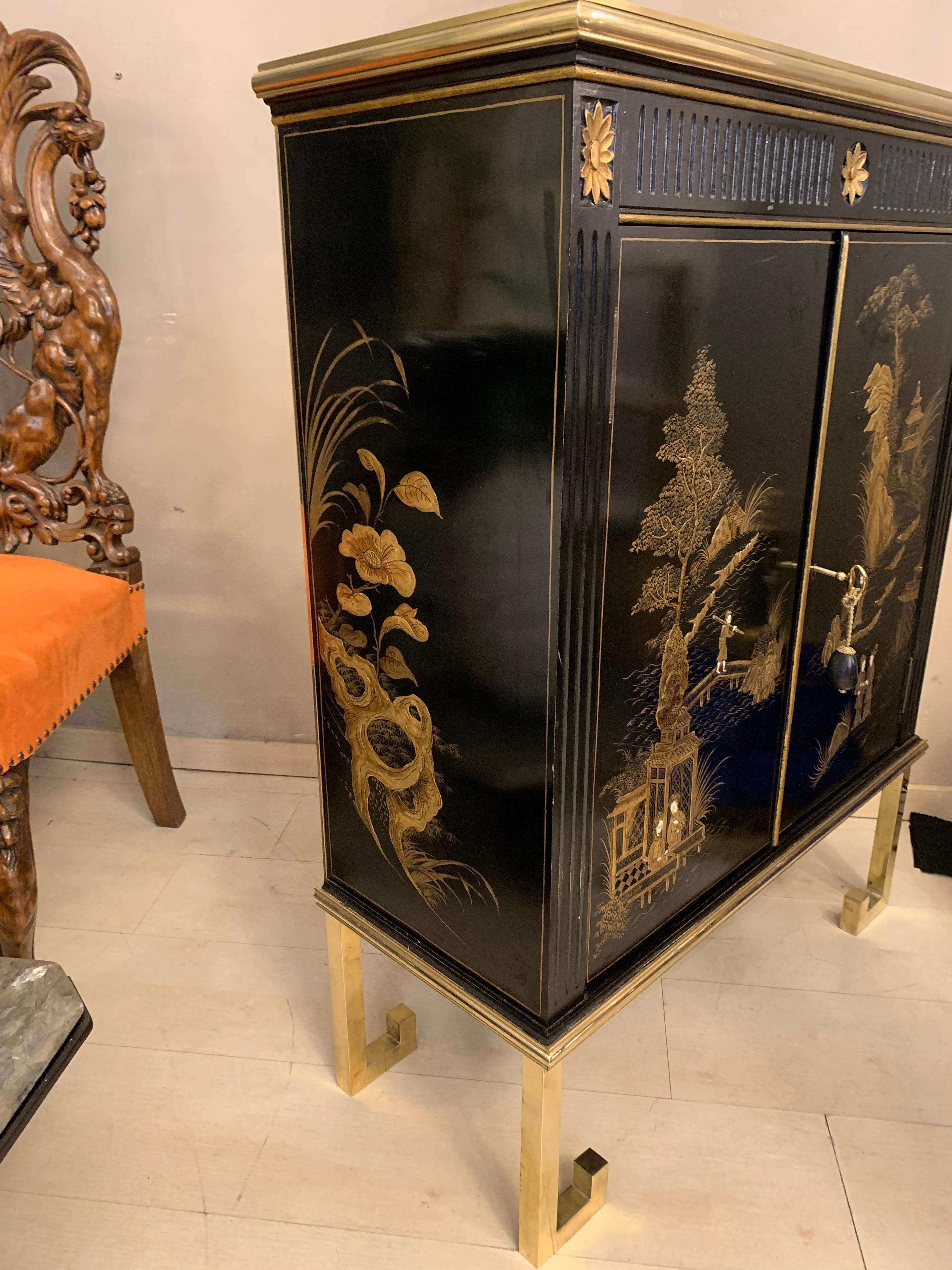 Black Lacquered Chinese Cabinet with Gilt Hand Painted Motifs, Early 1900 1