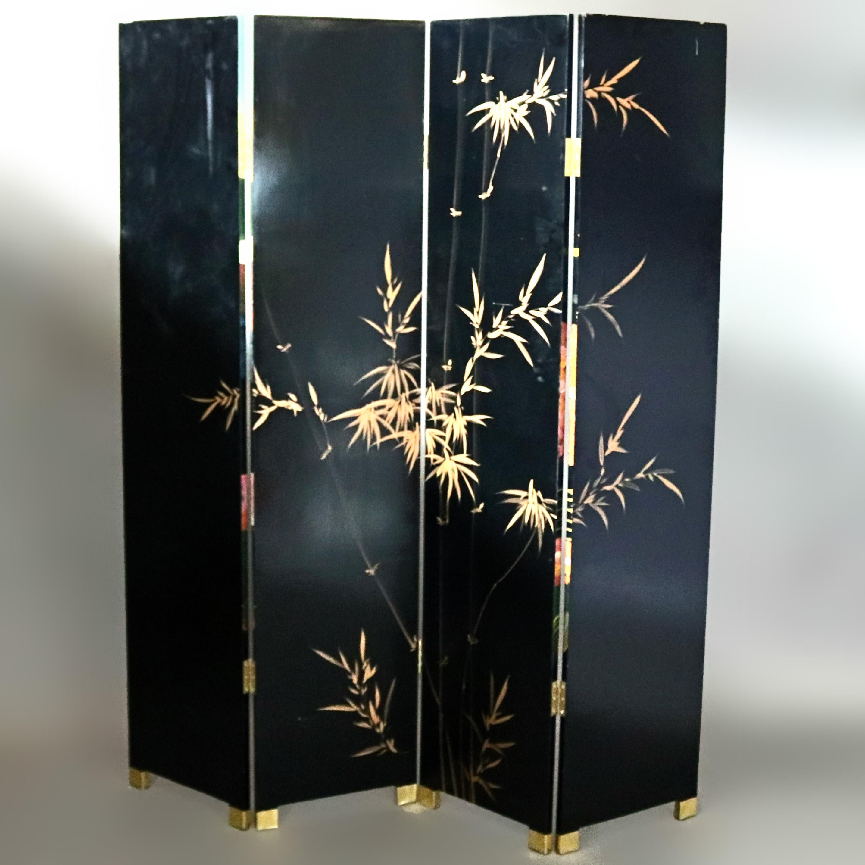 A Chinese dressing screen offers four panels having black lacquered finish, front with more recent Severin Roesen School fruit and foliate still life painting and en verso gilt bamboo painting, raised on brass feet, 20th century

***DELIVERY NOTICE