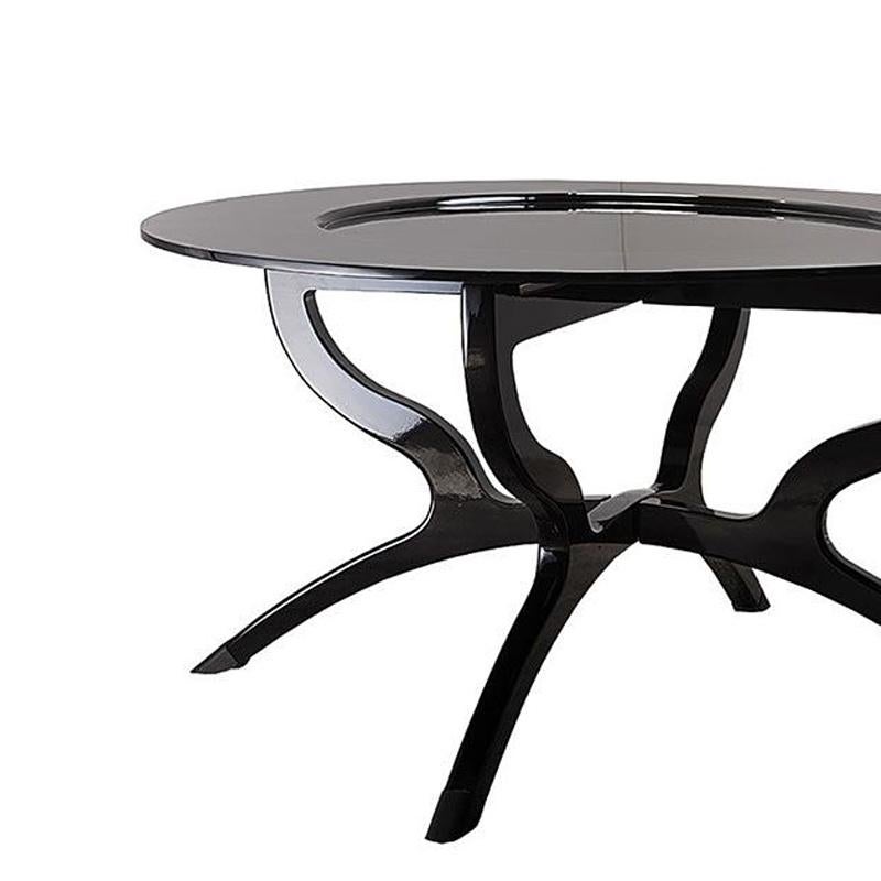 Coffee table black lacquered with hand carved solid wood structure in black lacquered finish.
 