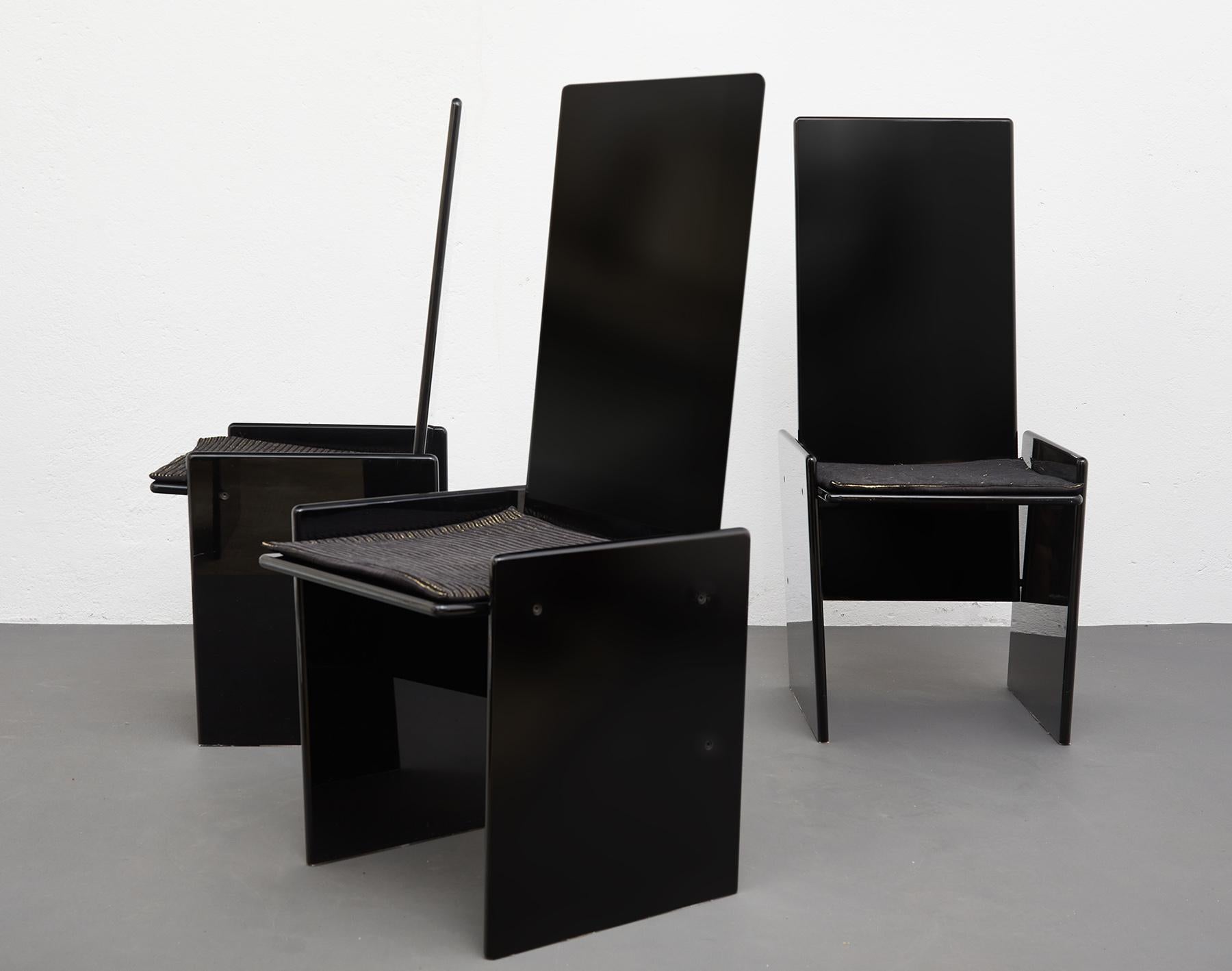 Black lacquered wood dining chairs Kazuki by Kazuhide Takahama for Simon Gavina, Italy.

The Japanese architect and designer Takahama emigrated to Italy end of the 1950's to start working with Diego Gavina with whom he started a long lasting