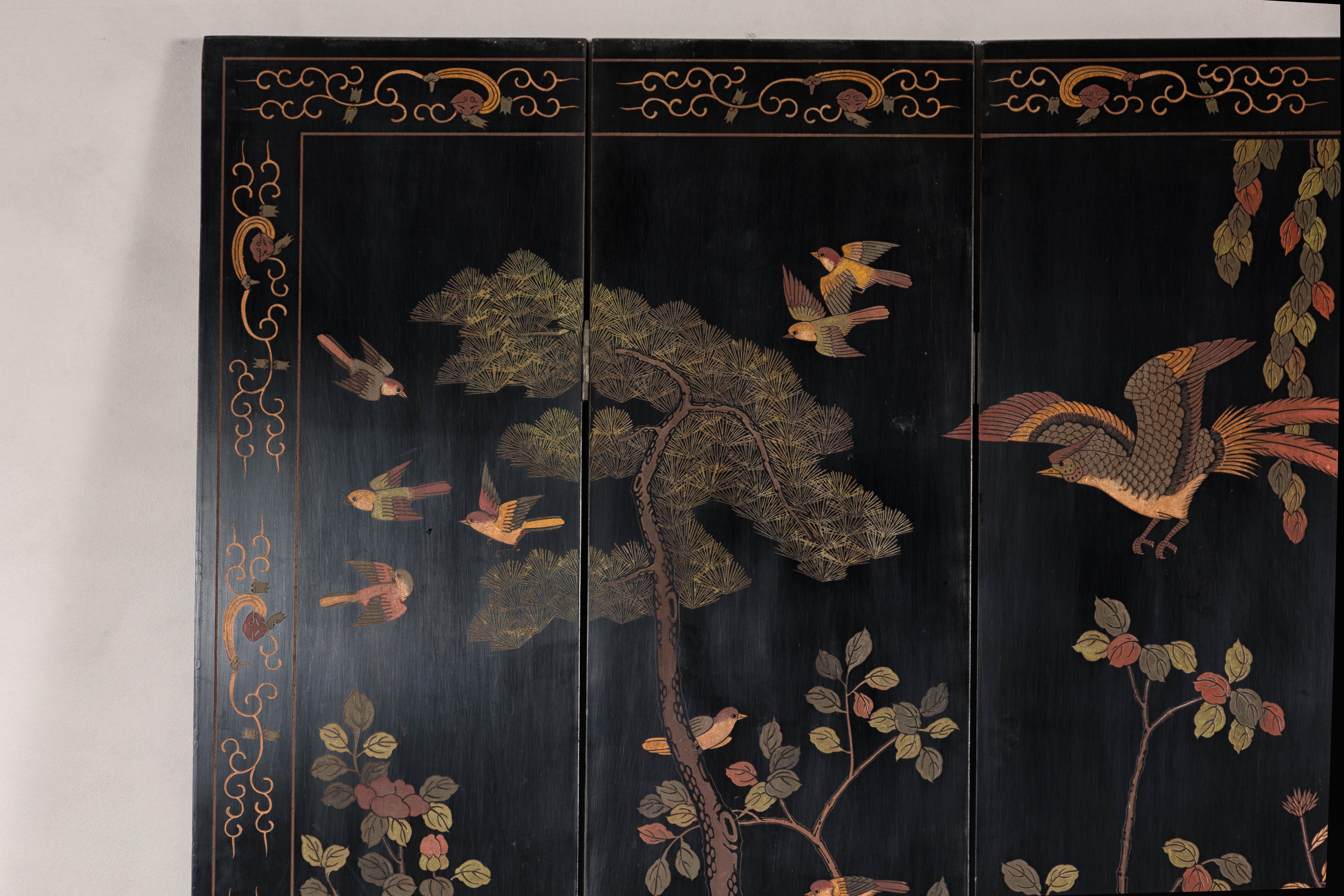 20th Century Black Lacquered Four-Panel Screen with Polychrome Bird, Foliage and Tree Décor For Sale