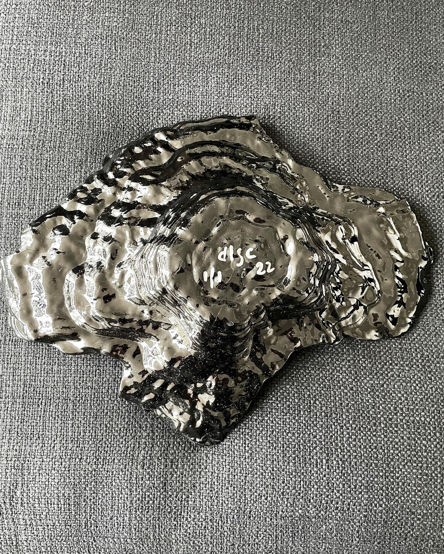 This one I don't want to find a new home for. Since this a joy to look at every day. But I would want to share this with the right person, so alas, I'll let it go.... This irregular natural shape of the substantial glass dish is beautiful. The eye