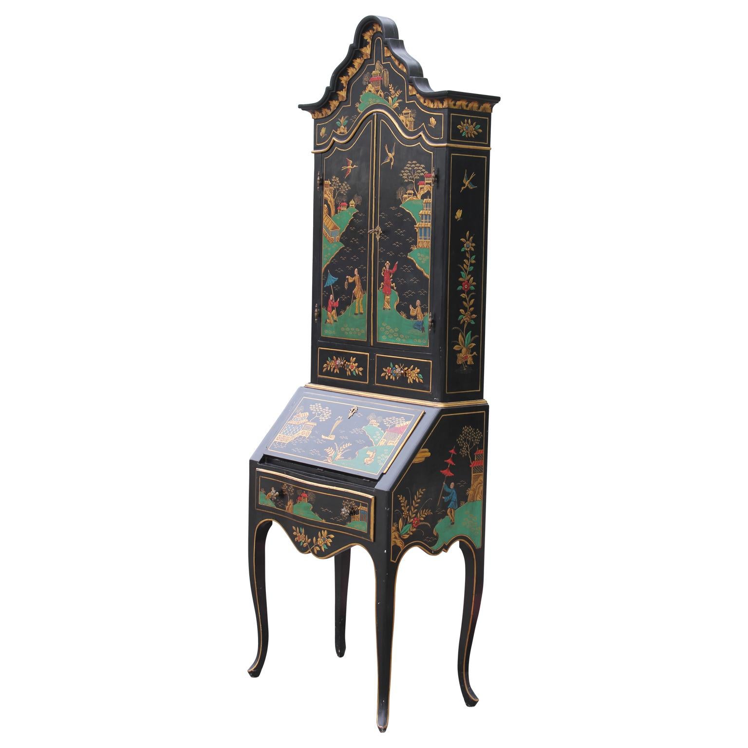 A beautiful black lacquered Italian chinoiserie secretary. Intricately painted detail of Chinese landscape. The top and bottom separates. There are drawers throughout and bottom opens to a drop down desk.