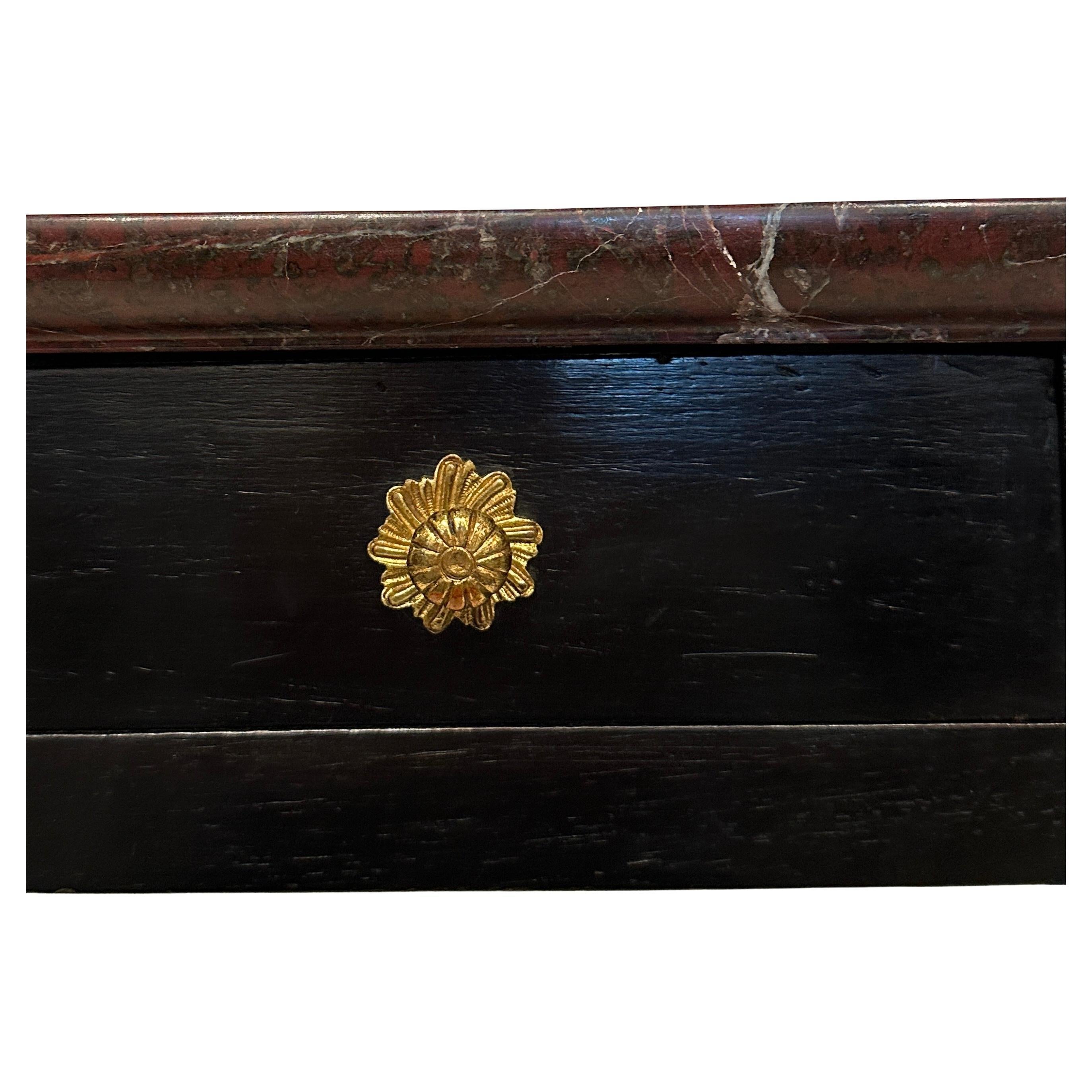 Charming Louis XV style black lacquered side table with raised edge, polished marble top.  One drawer.  Gilded bronze drawer pull and sabots. 