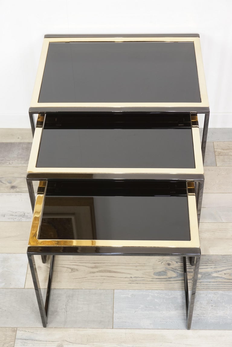 Black Lacquered Metal and Black Mirror Glass Nesting Tables Set For
